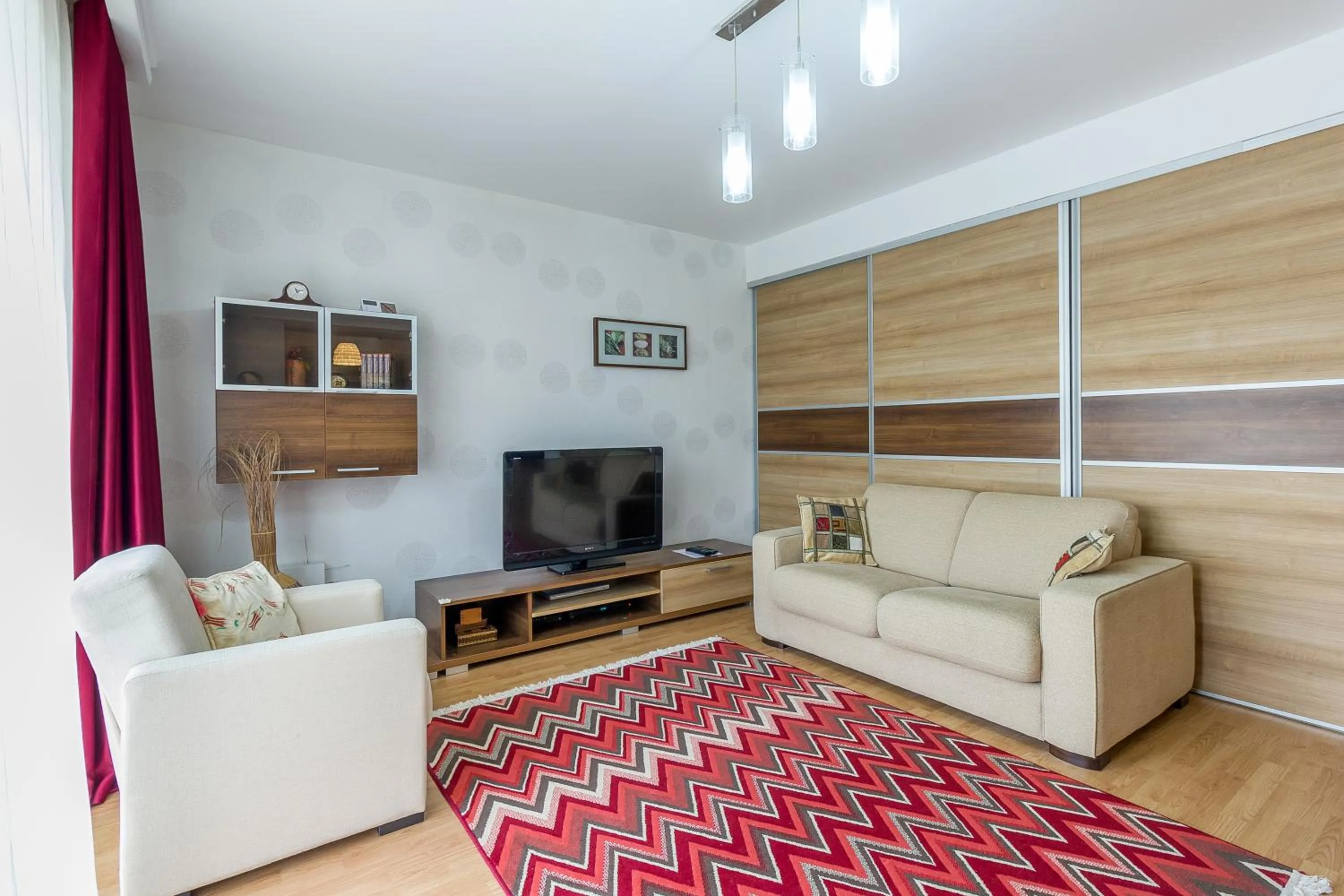 Photo of the whole room in City Apartment Trifoiului