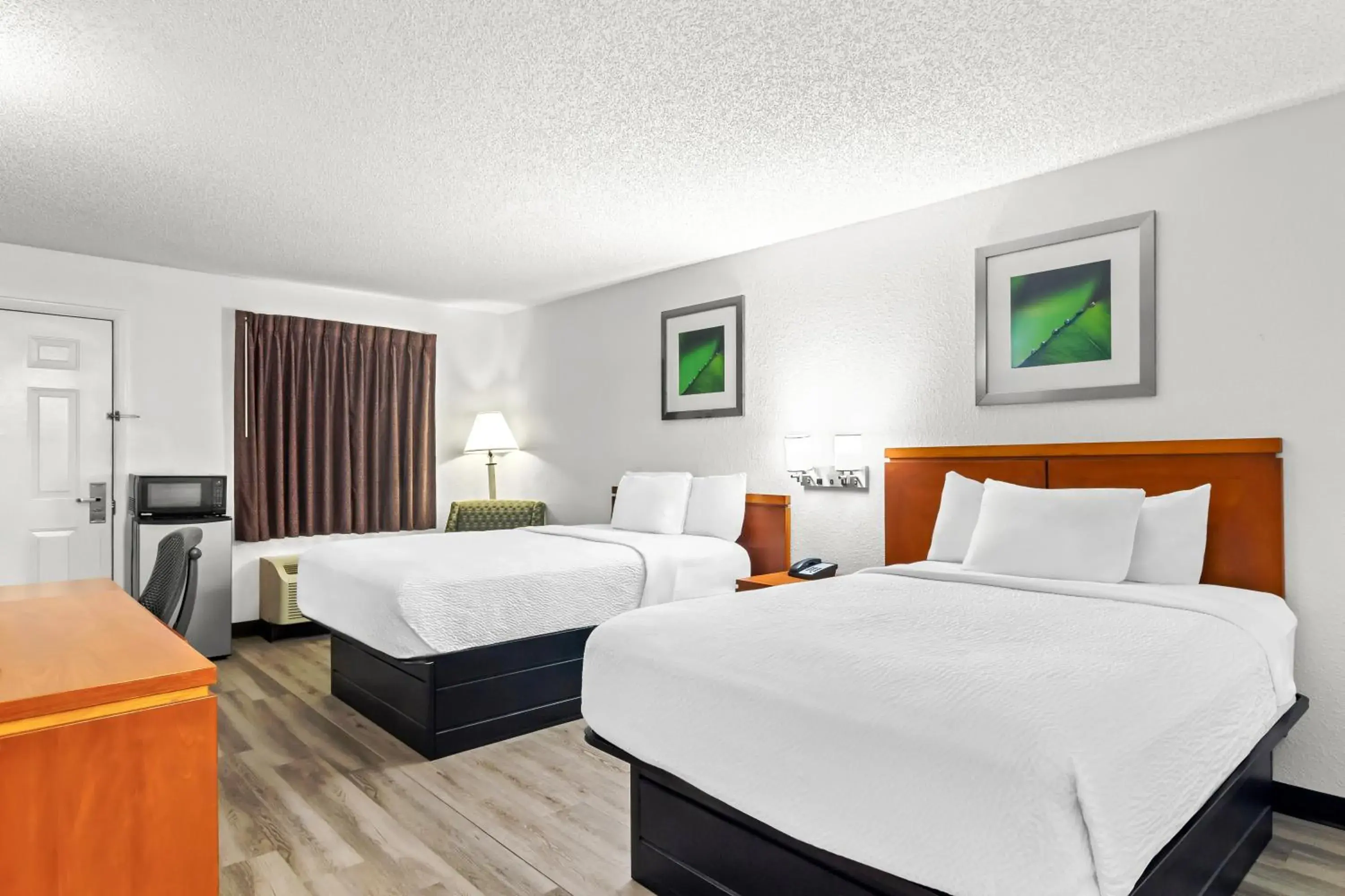 Deluxe Room in Homestay Inn and suites Deluxe Room in Homestay Inn and suites