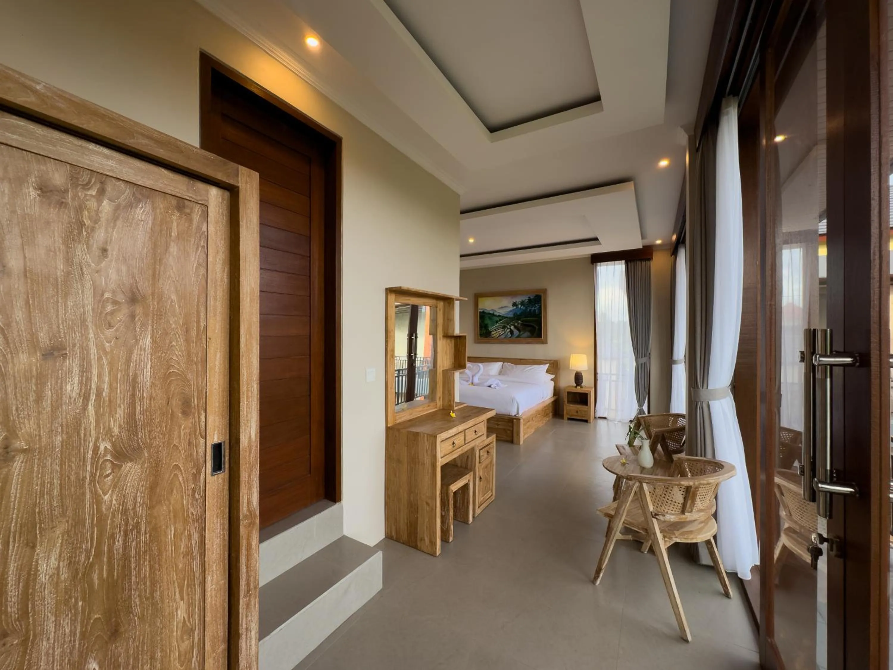 Seating area, Bed in Koeluma Bali