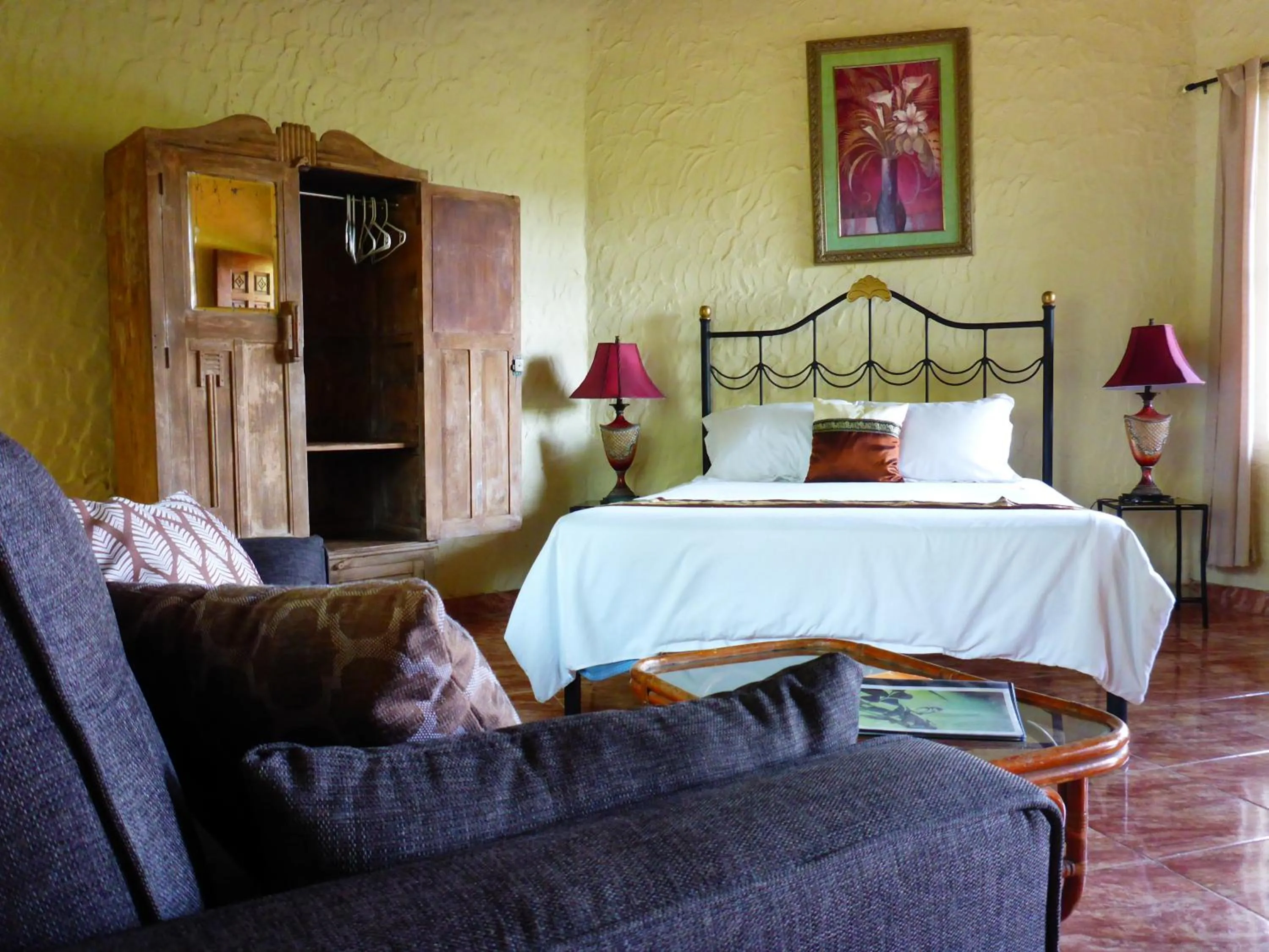 Bed in The Golden Frog Inn