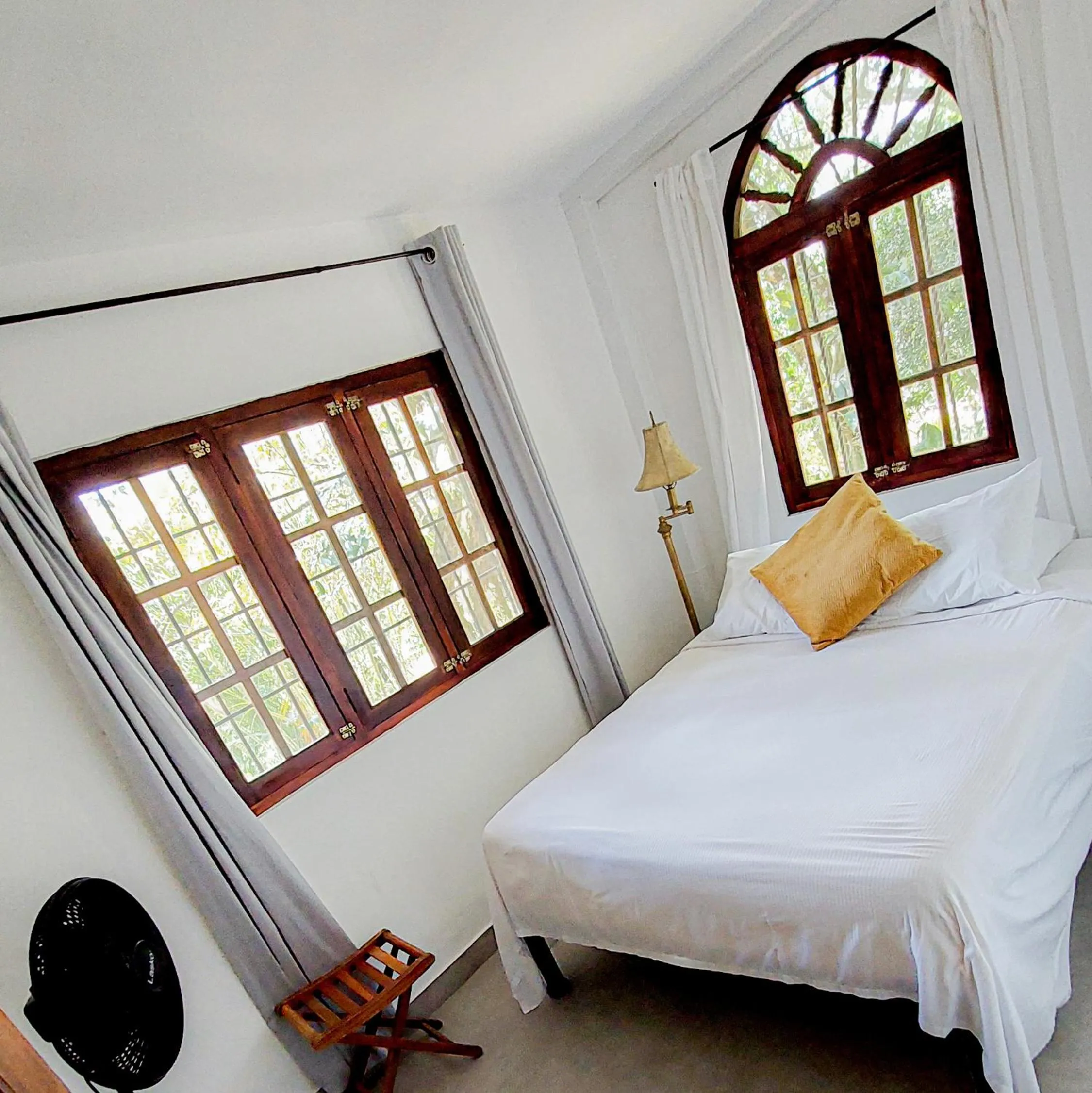 Bed in The Golden Frog Inn