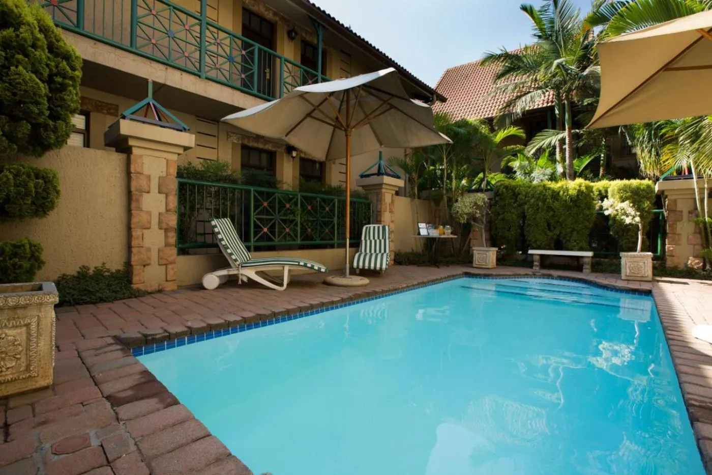 Property building in Court Classique Suite Hotel