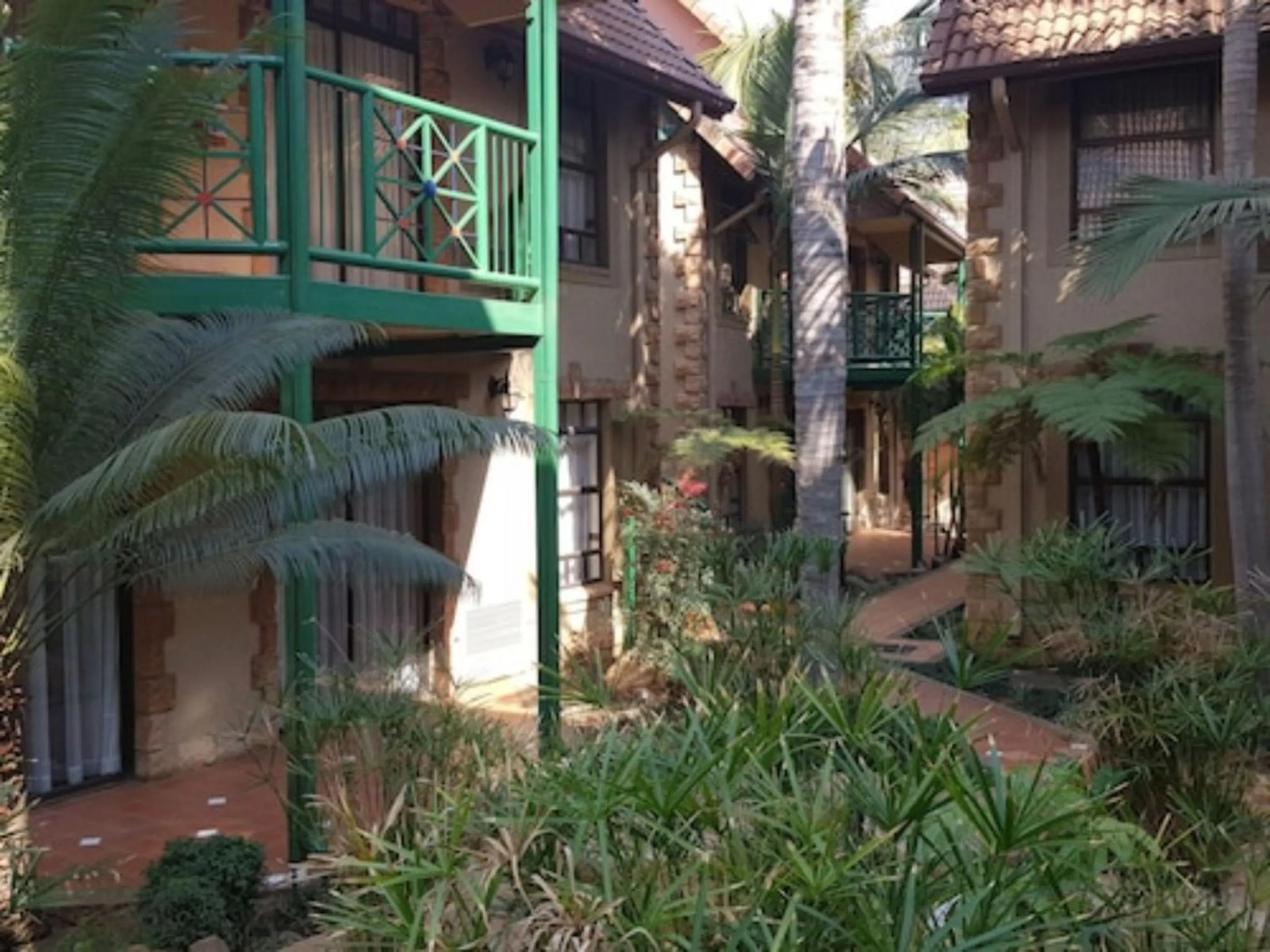 Property building in Court Classique Suite Hotel