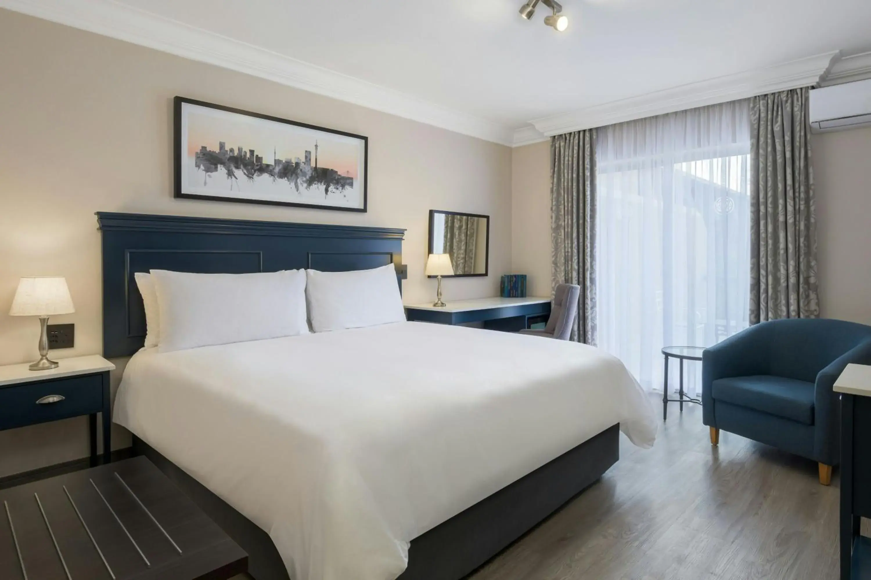King Guest Room with Balcony - single occupancy in Protea Hotel by Marriott Johannesburg Balalaika Sandton King Guest Room with Balcony - single occupancy in Protea Hotel by Marriott Johannesburg Balalaika Sandton