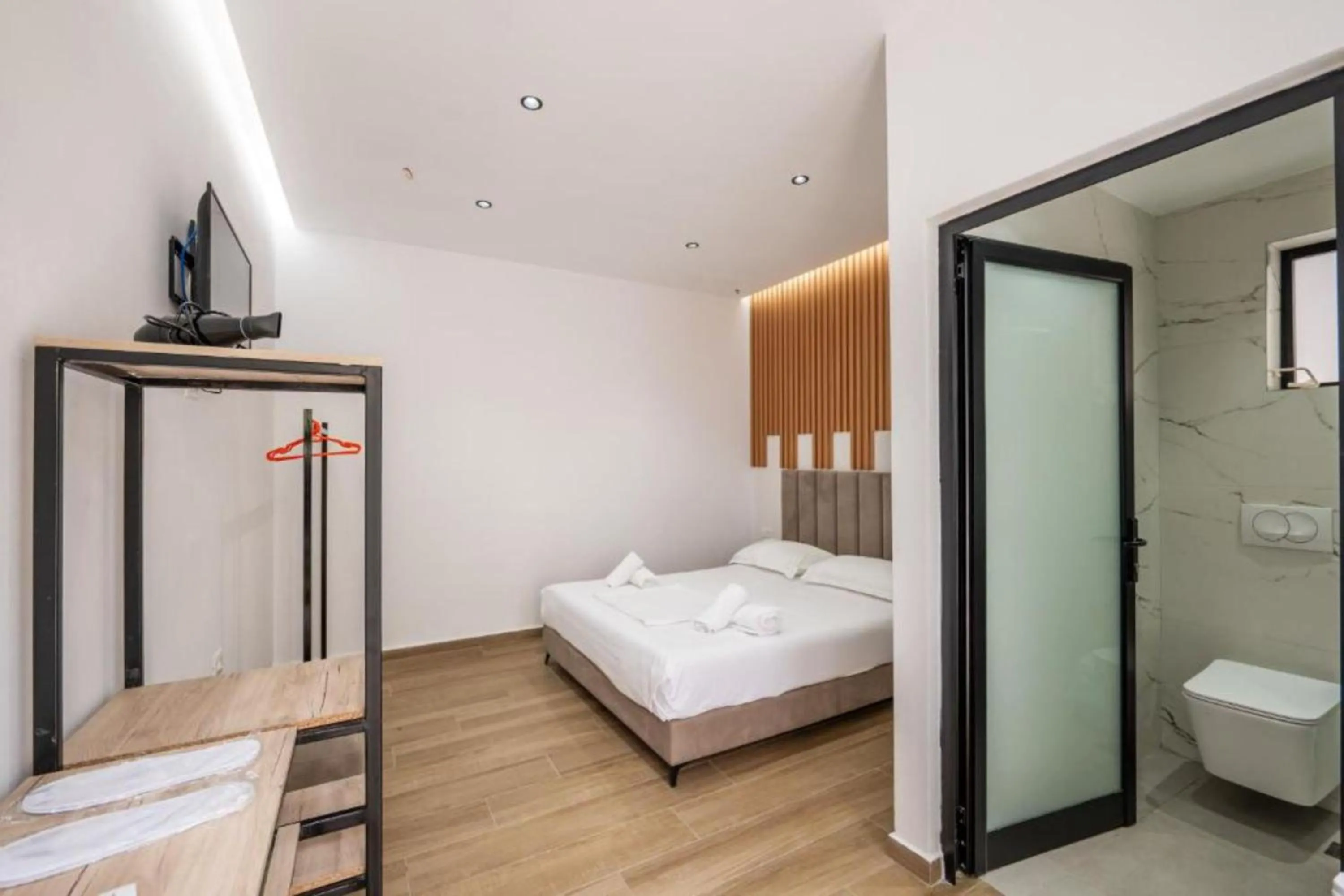 Toilet, Bed in Azure Bay Resort