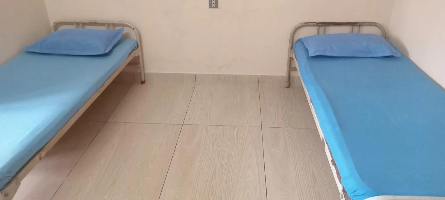 Bed in Sithara Guest House