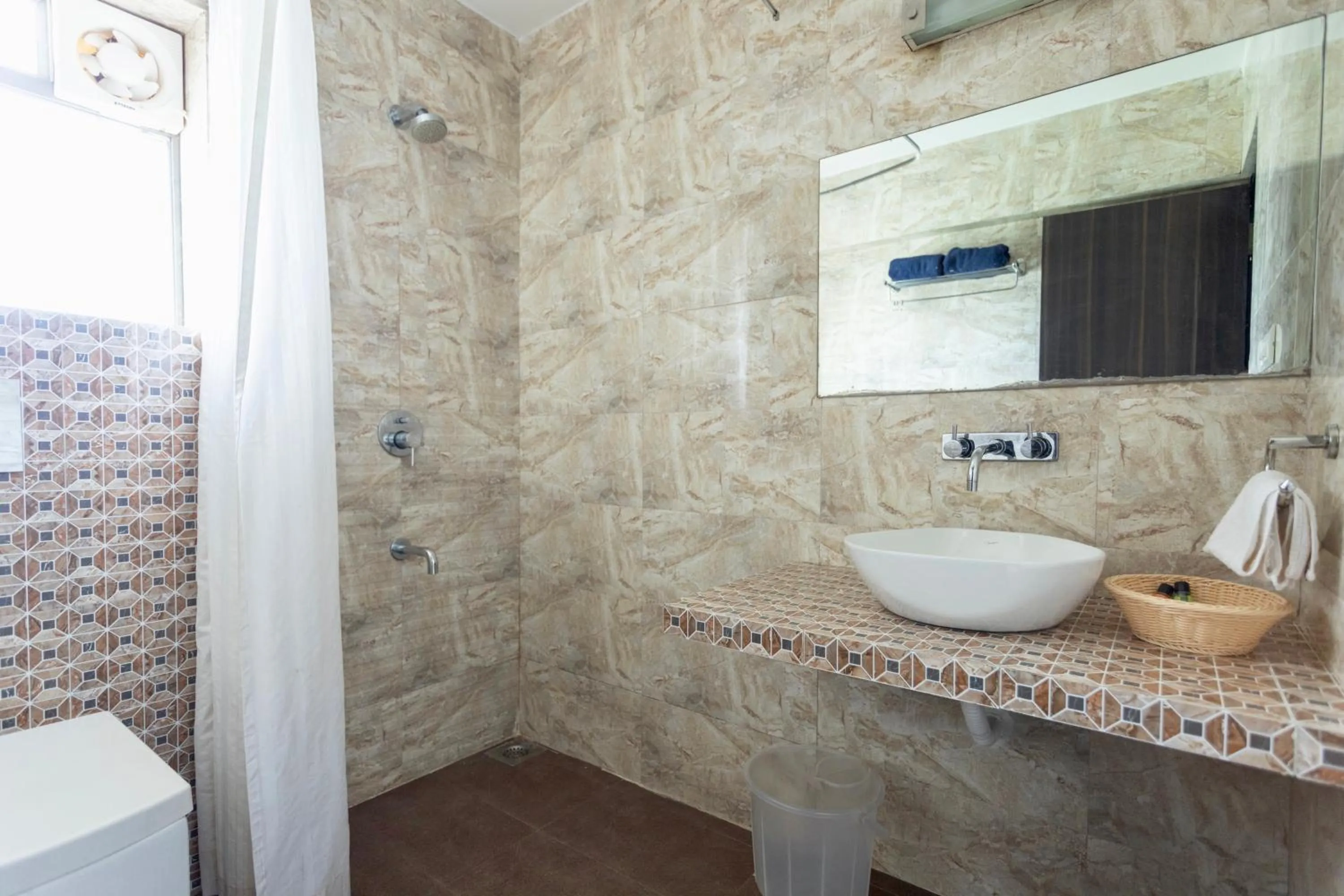 Bathroom in Arotel Rooms & Suites Calangute