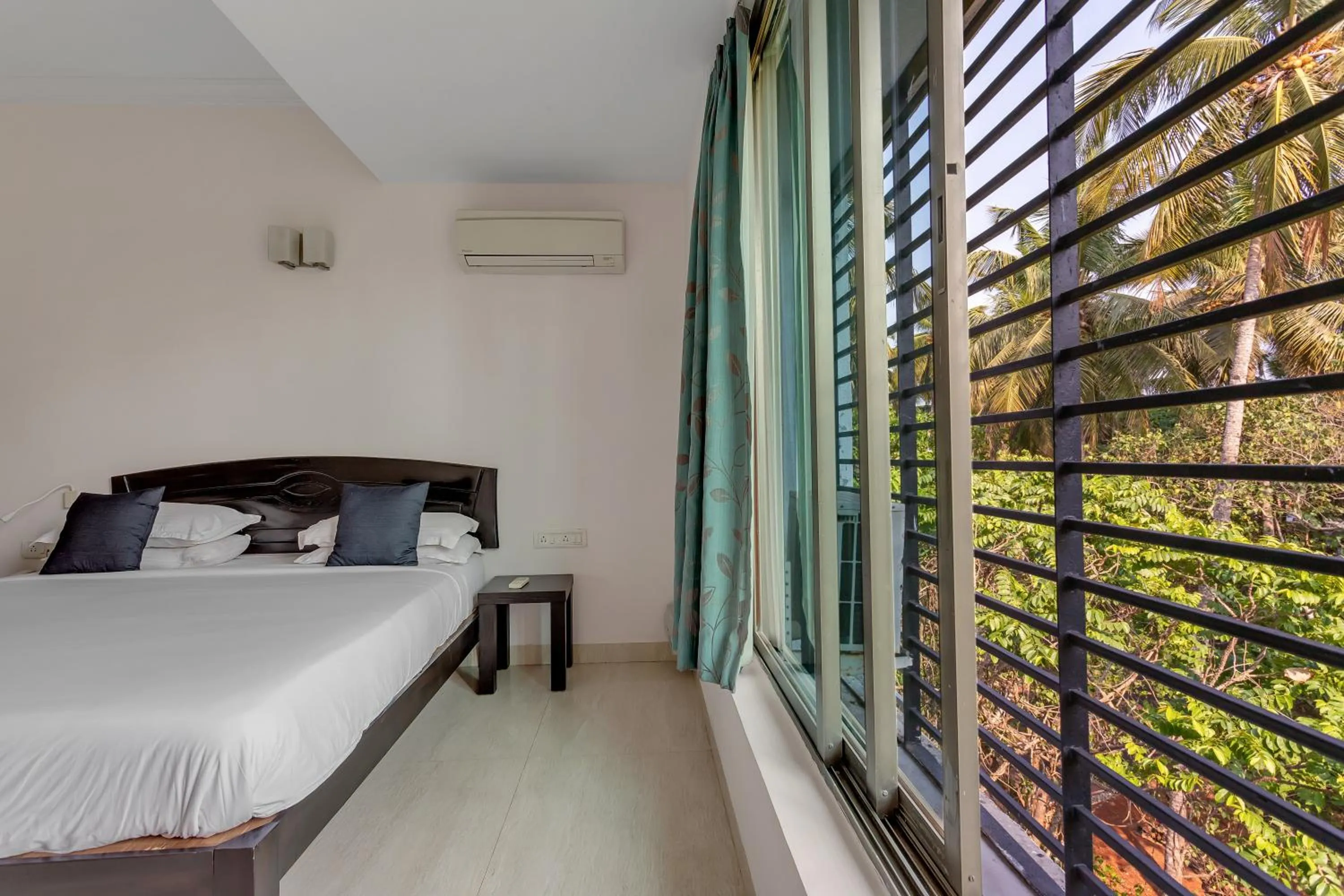 View (from property/room), Bed in Arotel Rooms & Suites Calangute