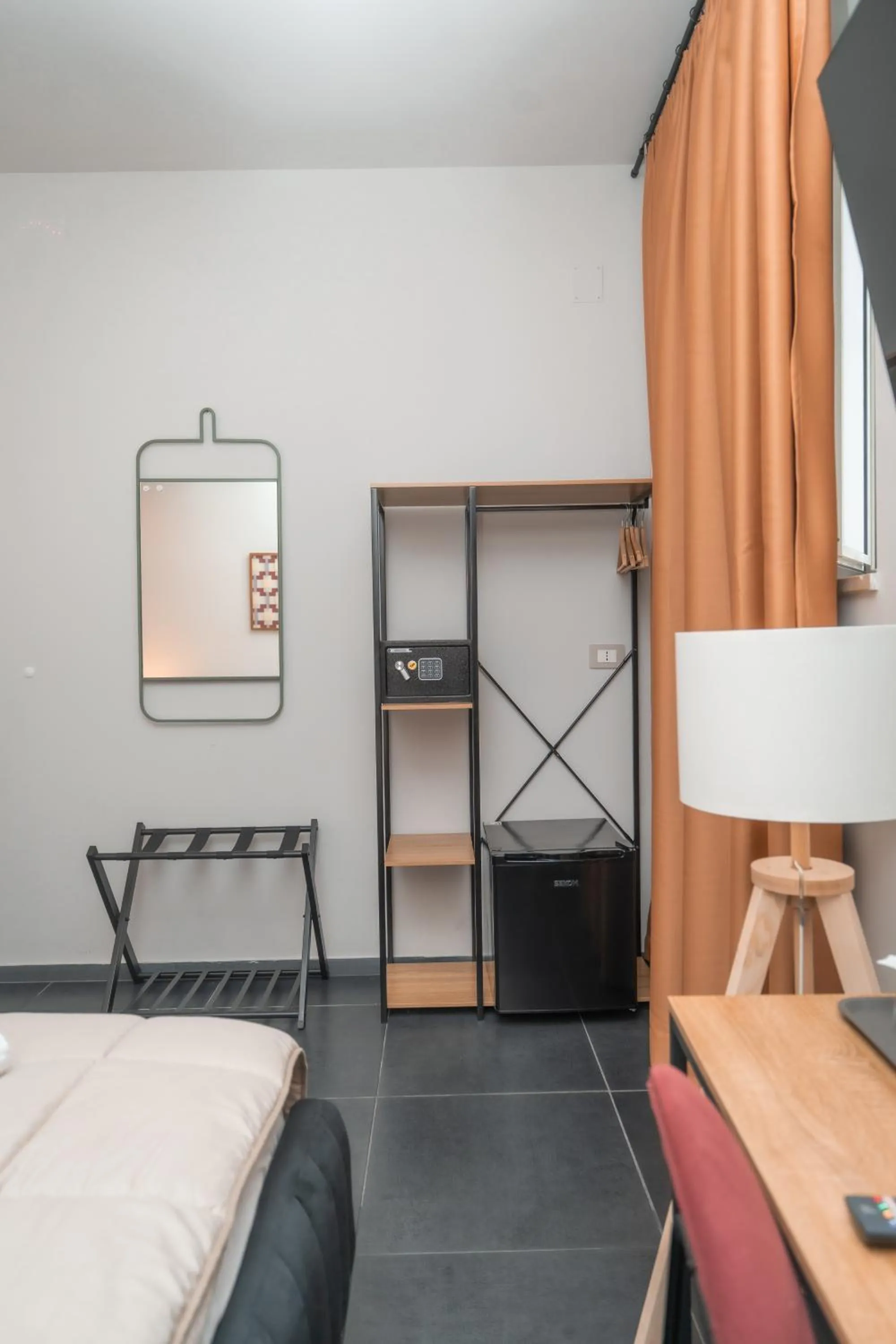 Bed in Noah Gate Hotel & Suites