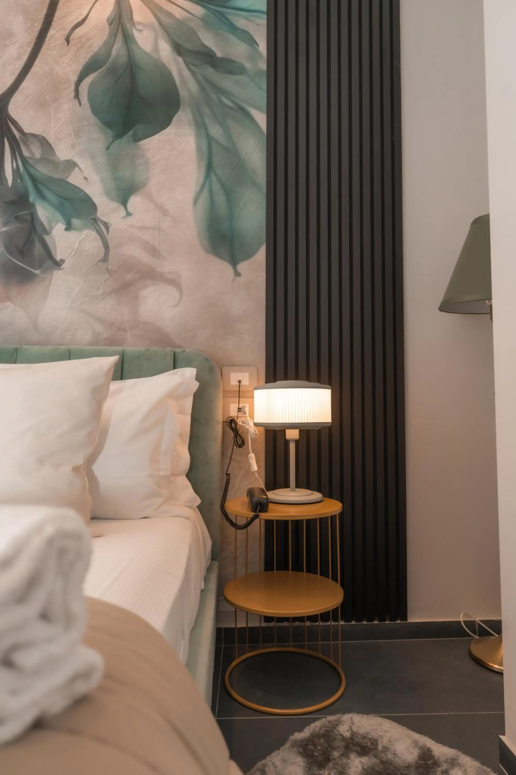 Bed in Noah Gate Hotel & Suites