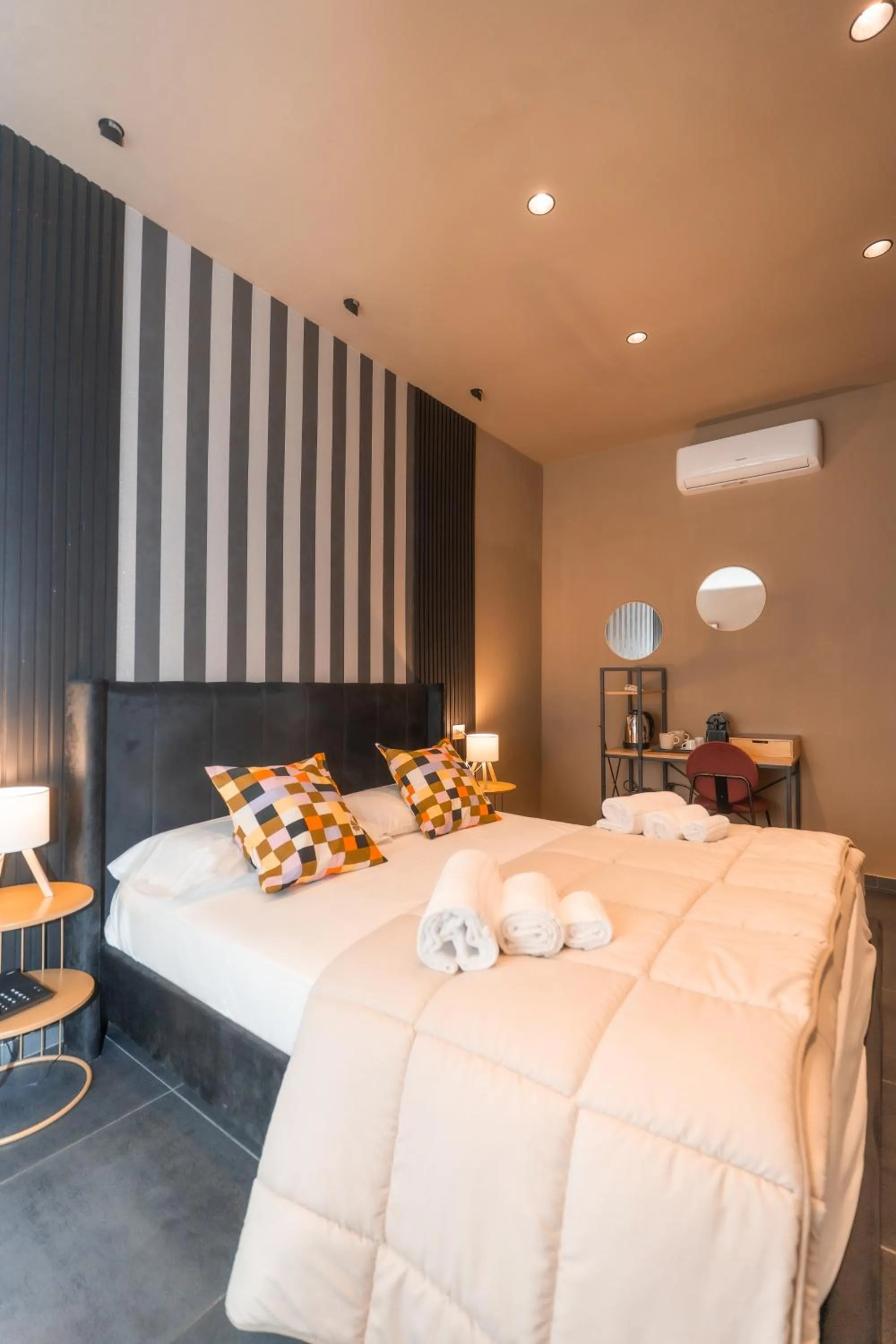 Bed in Noah Gate Hotel & Suites