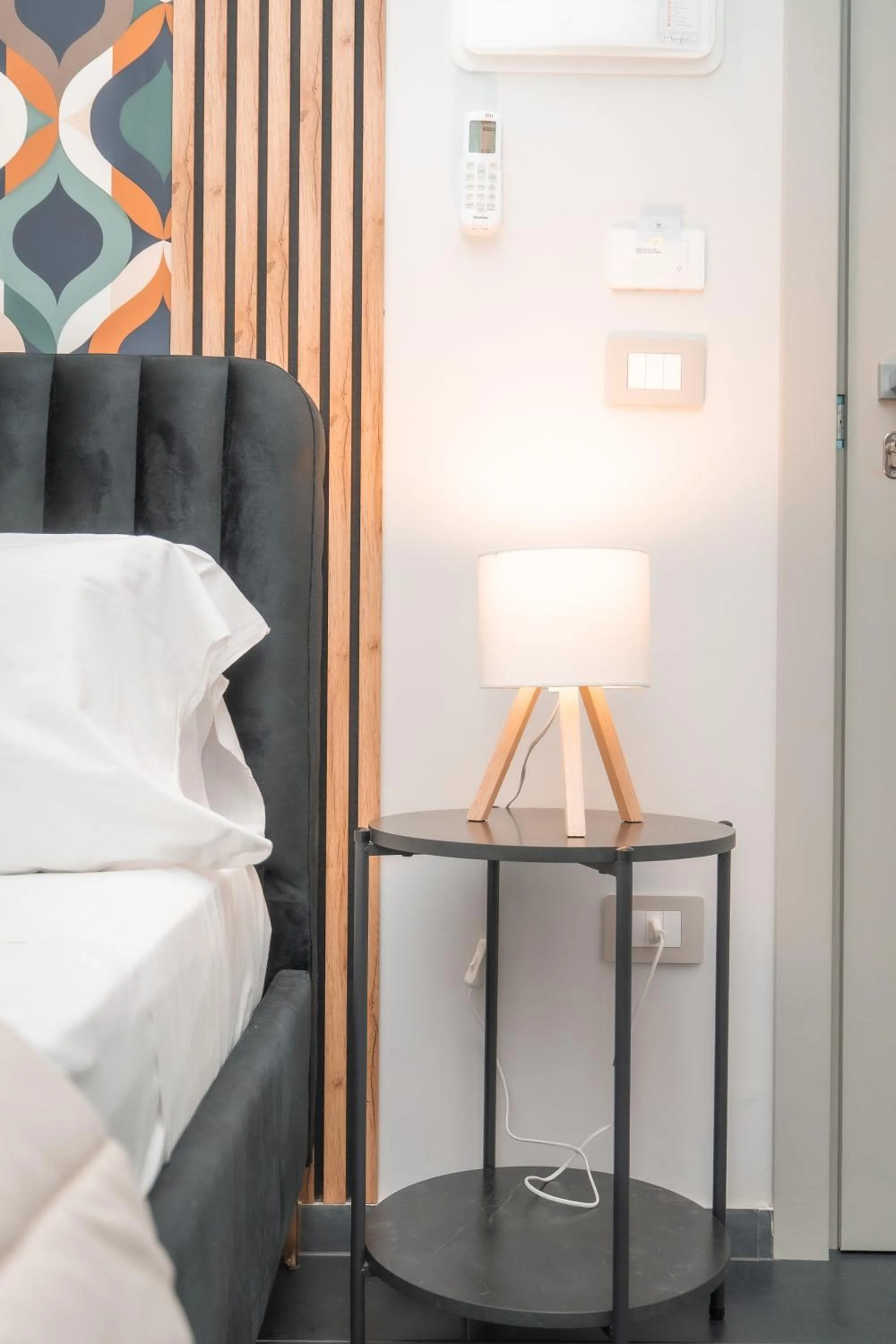 Bed in Noah Gate Hotel & Suites