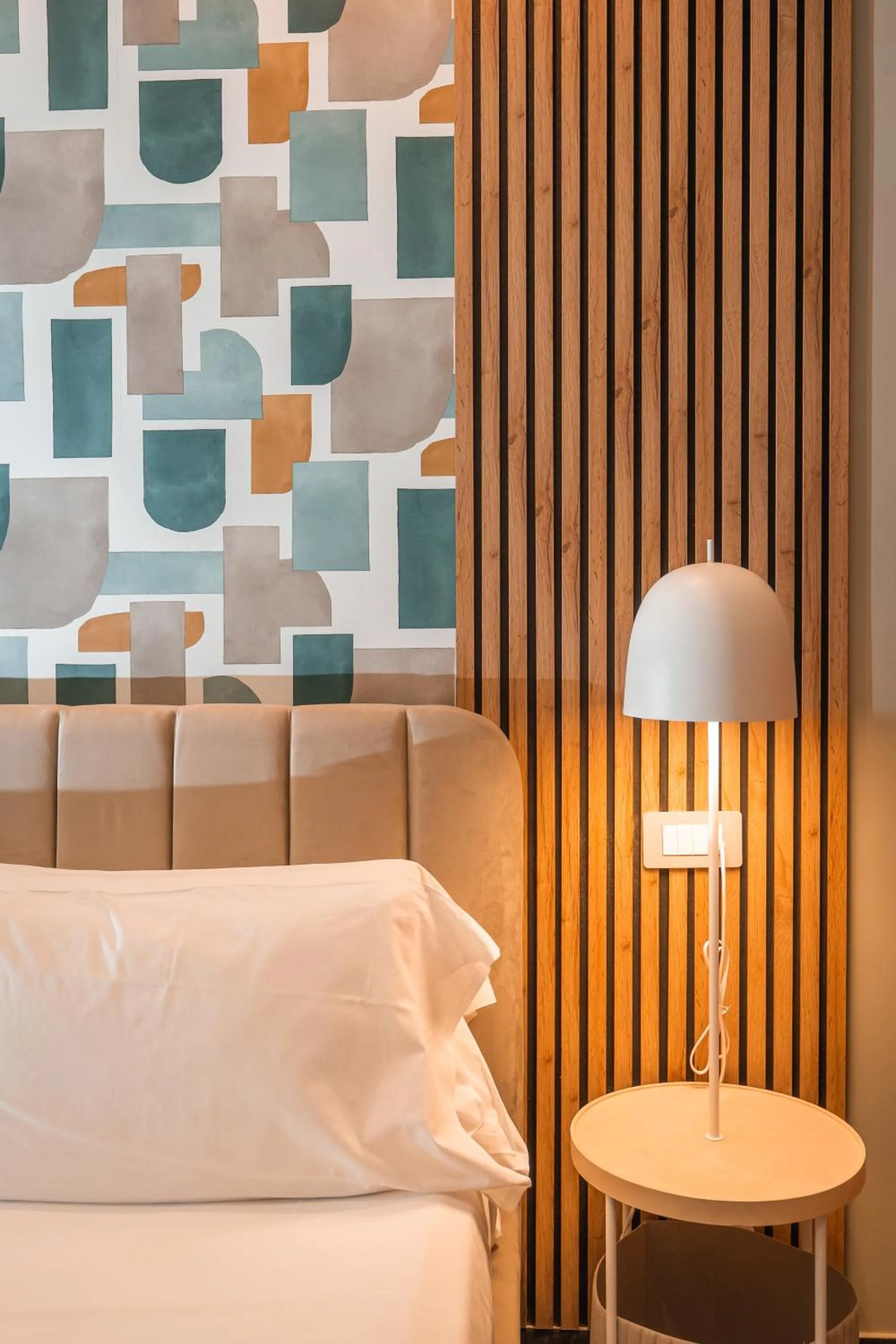 Bed in Noah Gate Hotel & Suites
