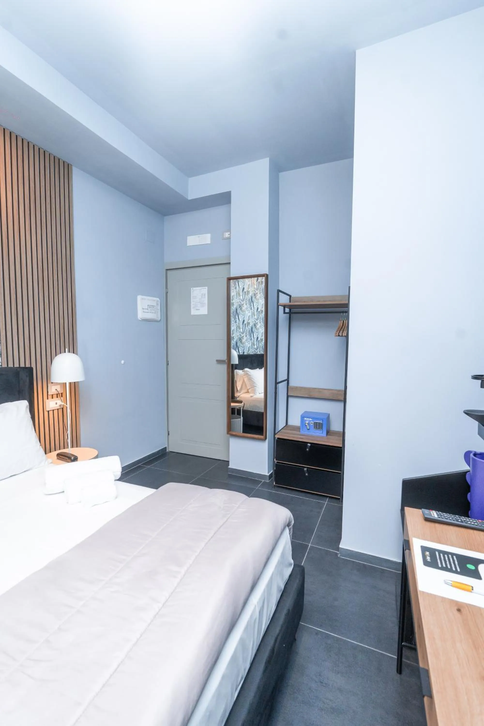 Bed in Noah Gate Hotel & Suites