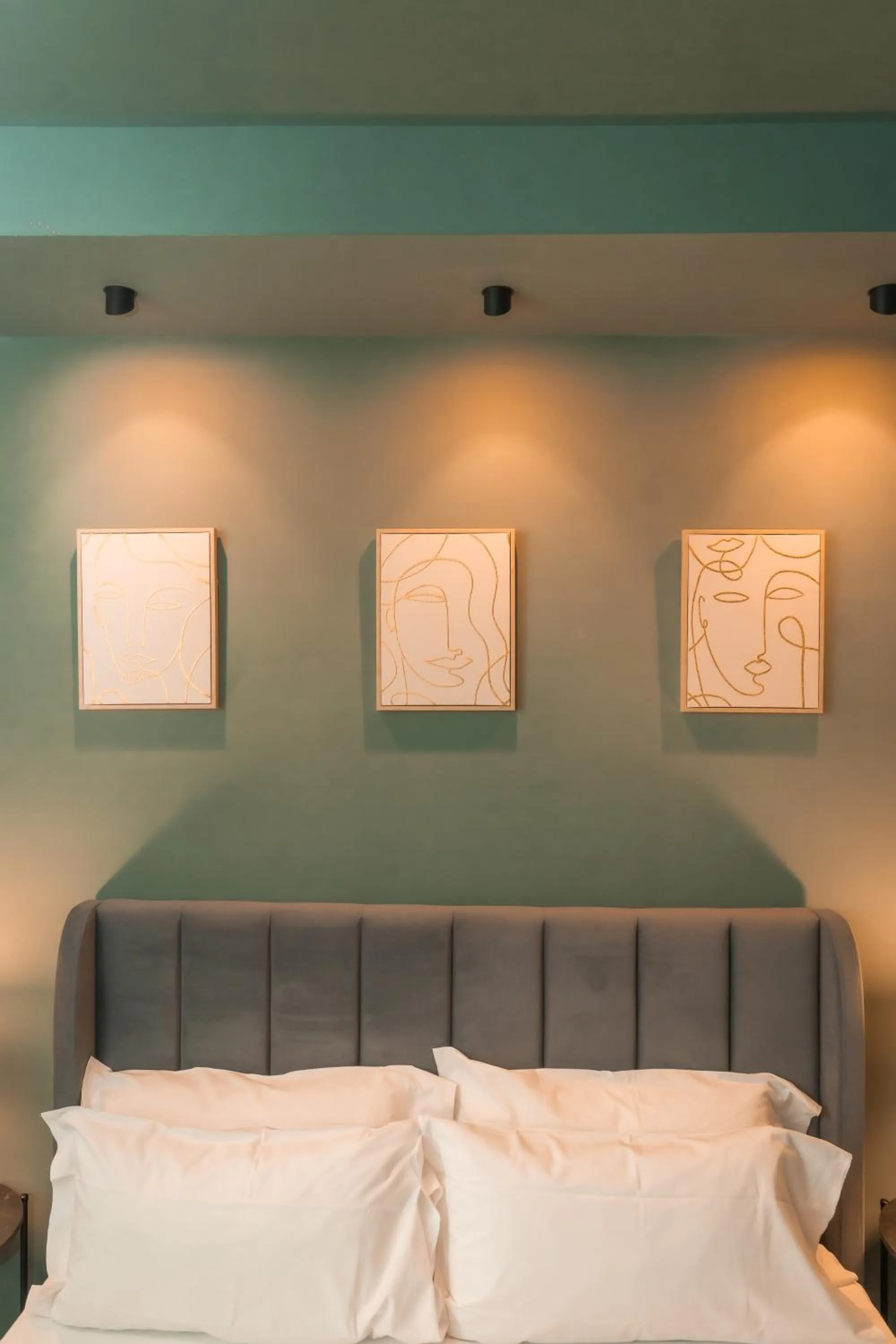 Bed in Noah Gate Hotel & Suites