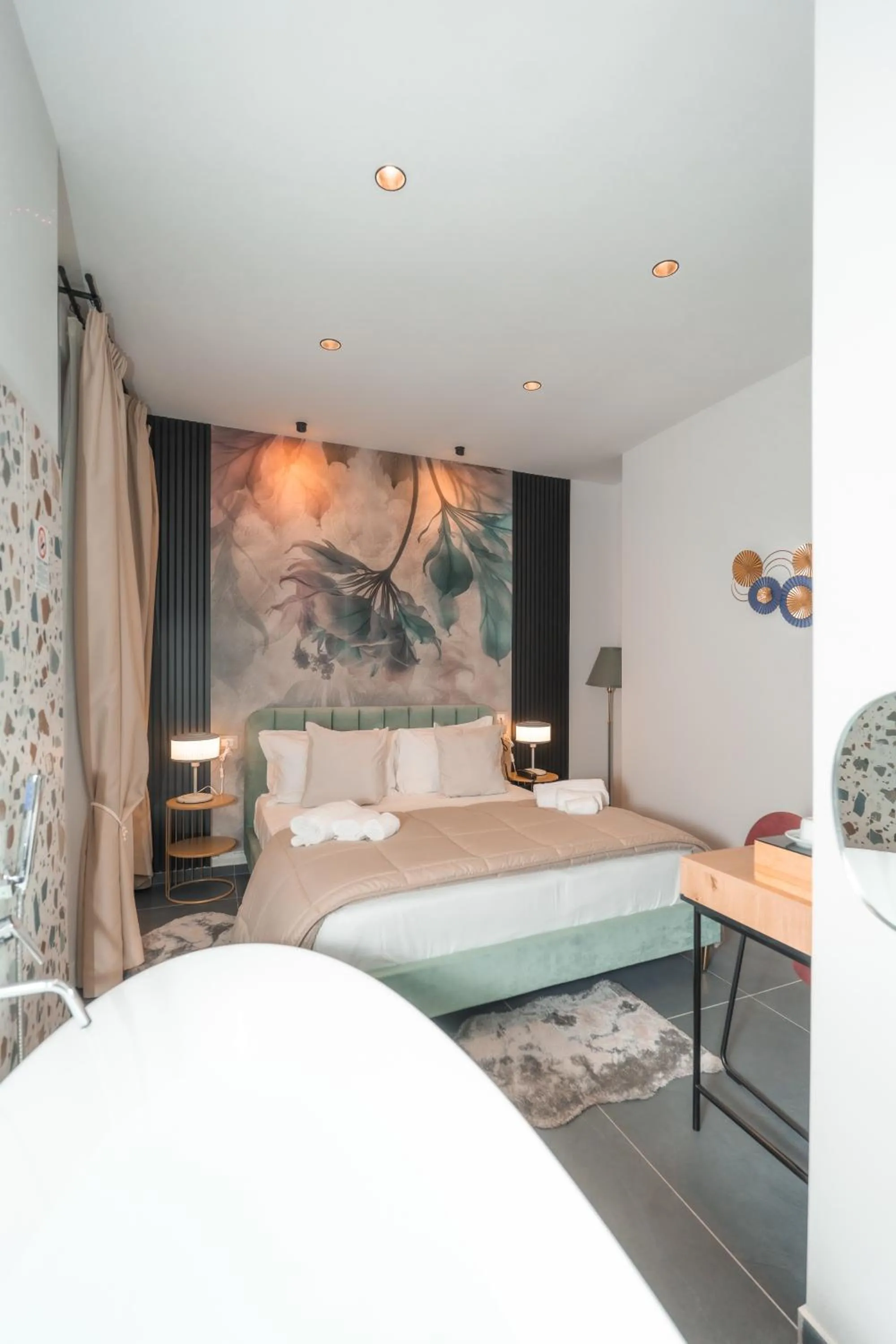Bed in Noah Gate Hotel & Suites