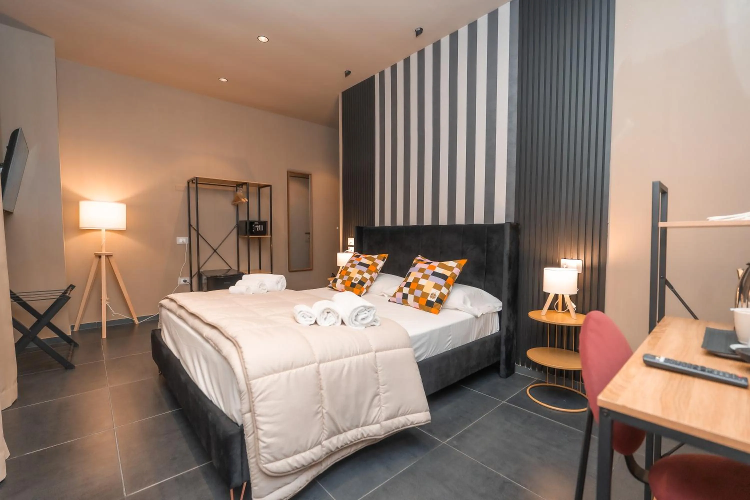 Bed in Noah Gate Hotel & Suites