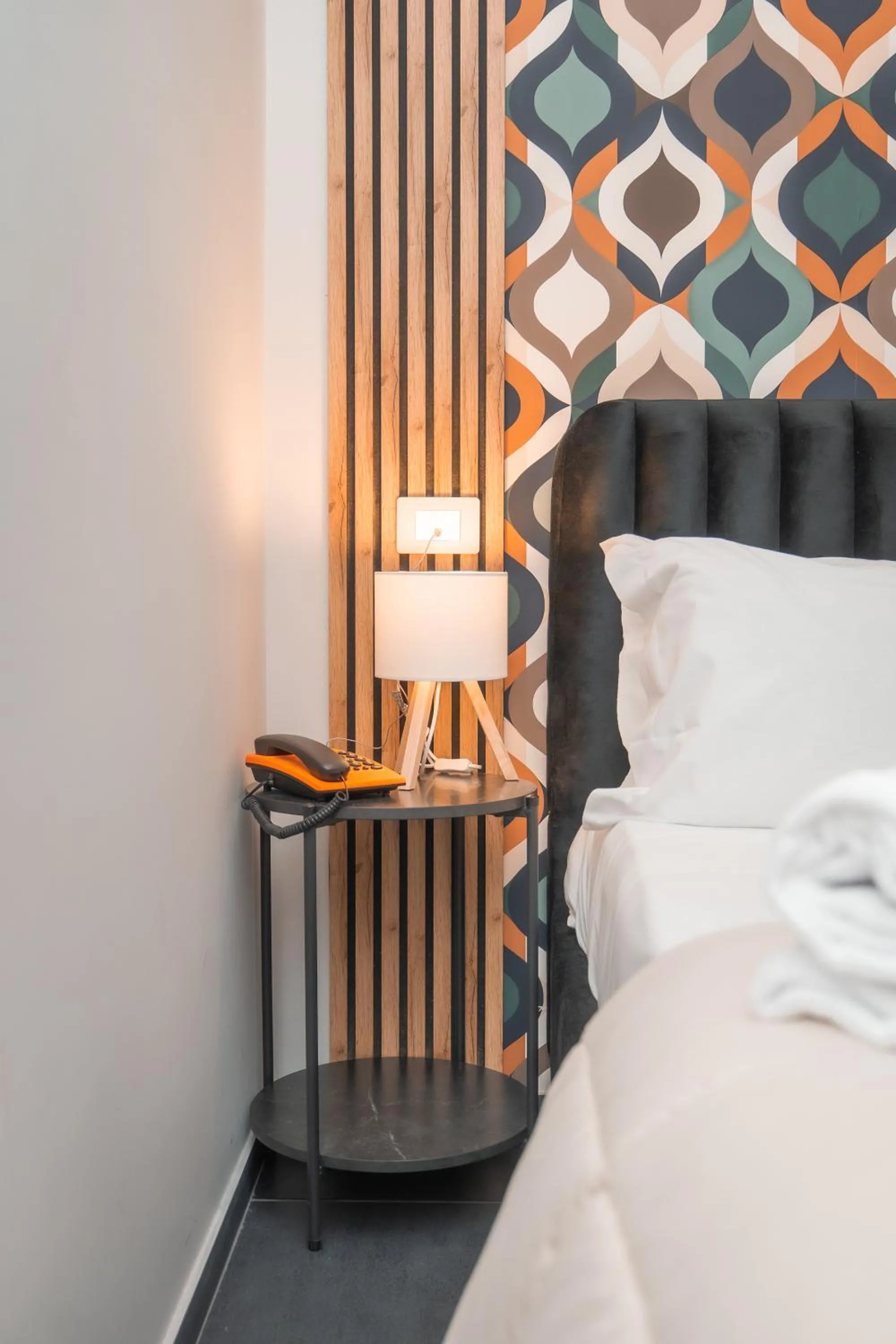 Bed in Noah Gate Hotel & Suites