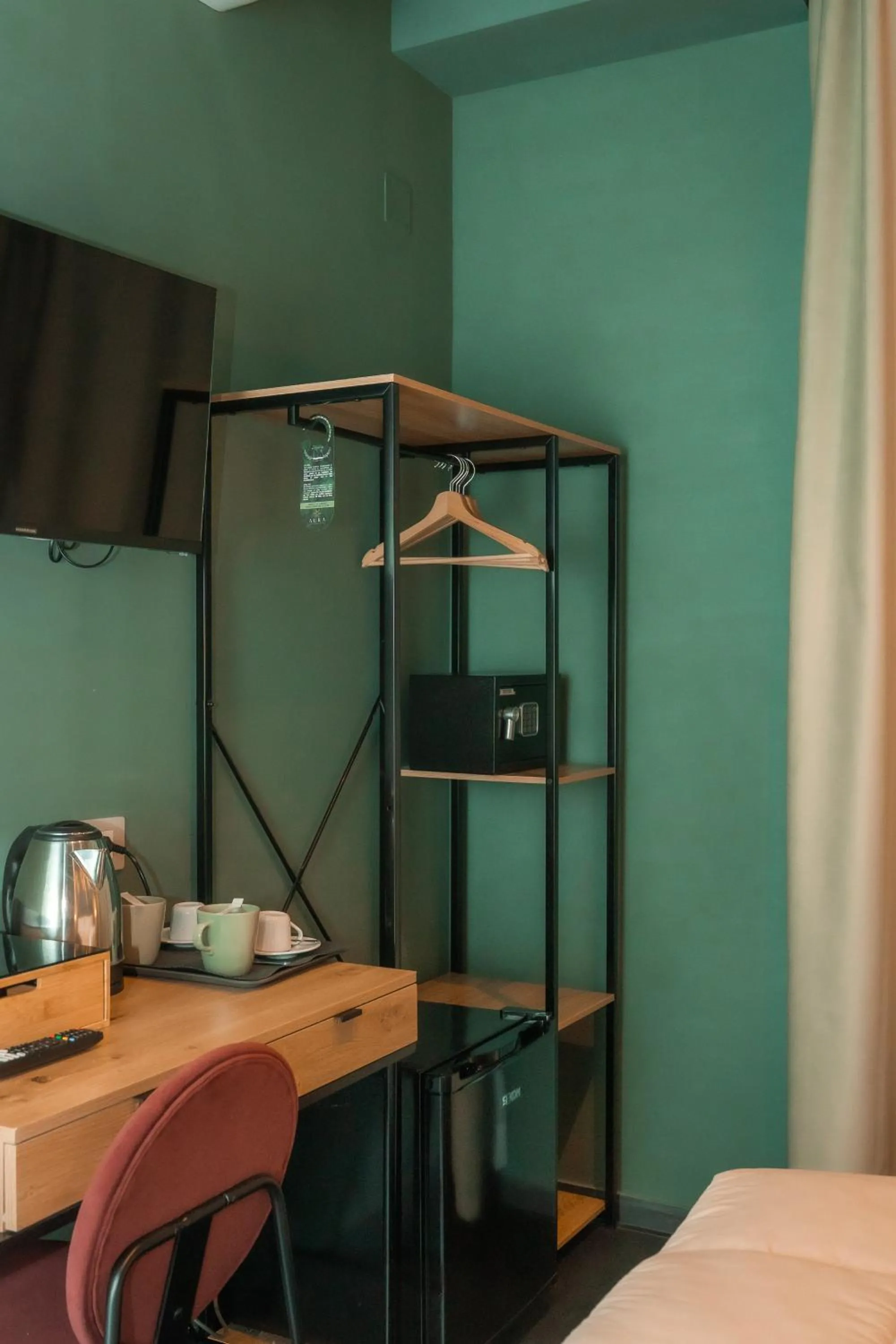 Bed in Noah Gate Hotel & Suites