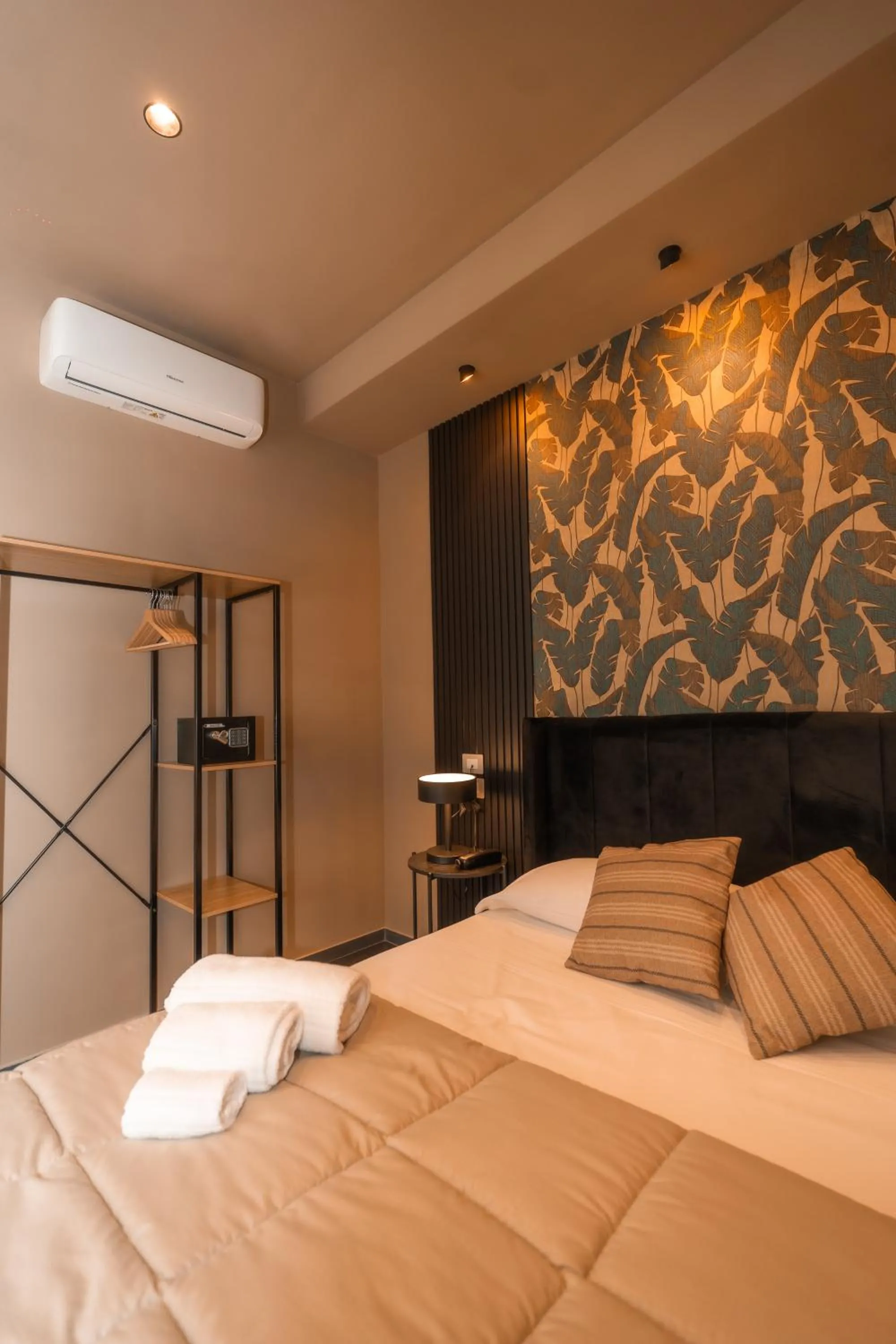 Bed in Noah Gate Hotel & Suites