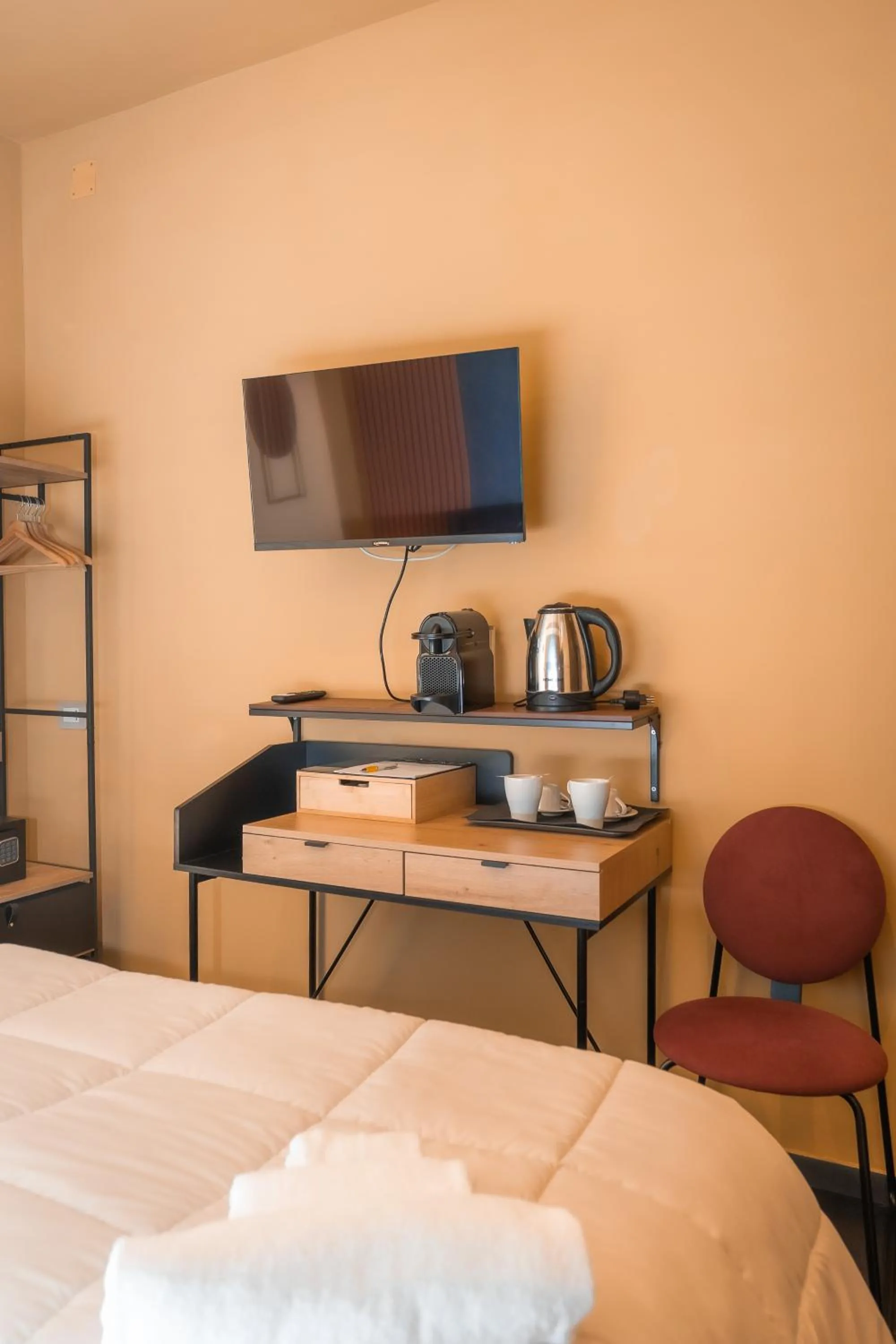 Bed in Noah Gate Hotel & Suites