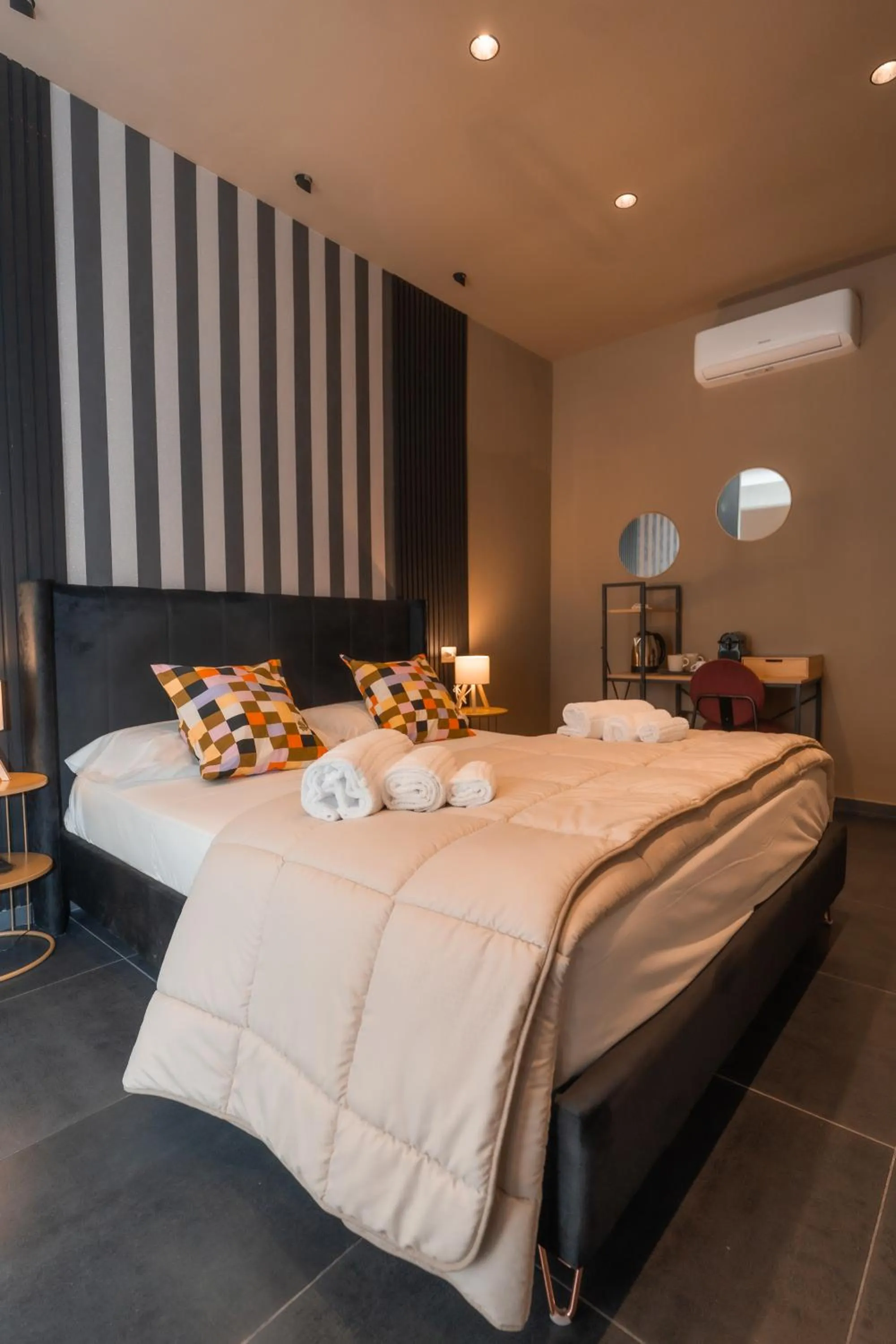 Bed in Noah Gate Hotel & Suites