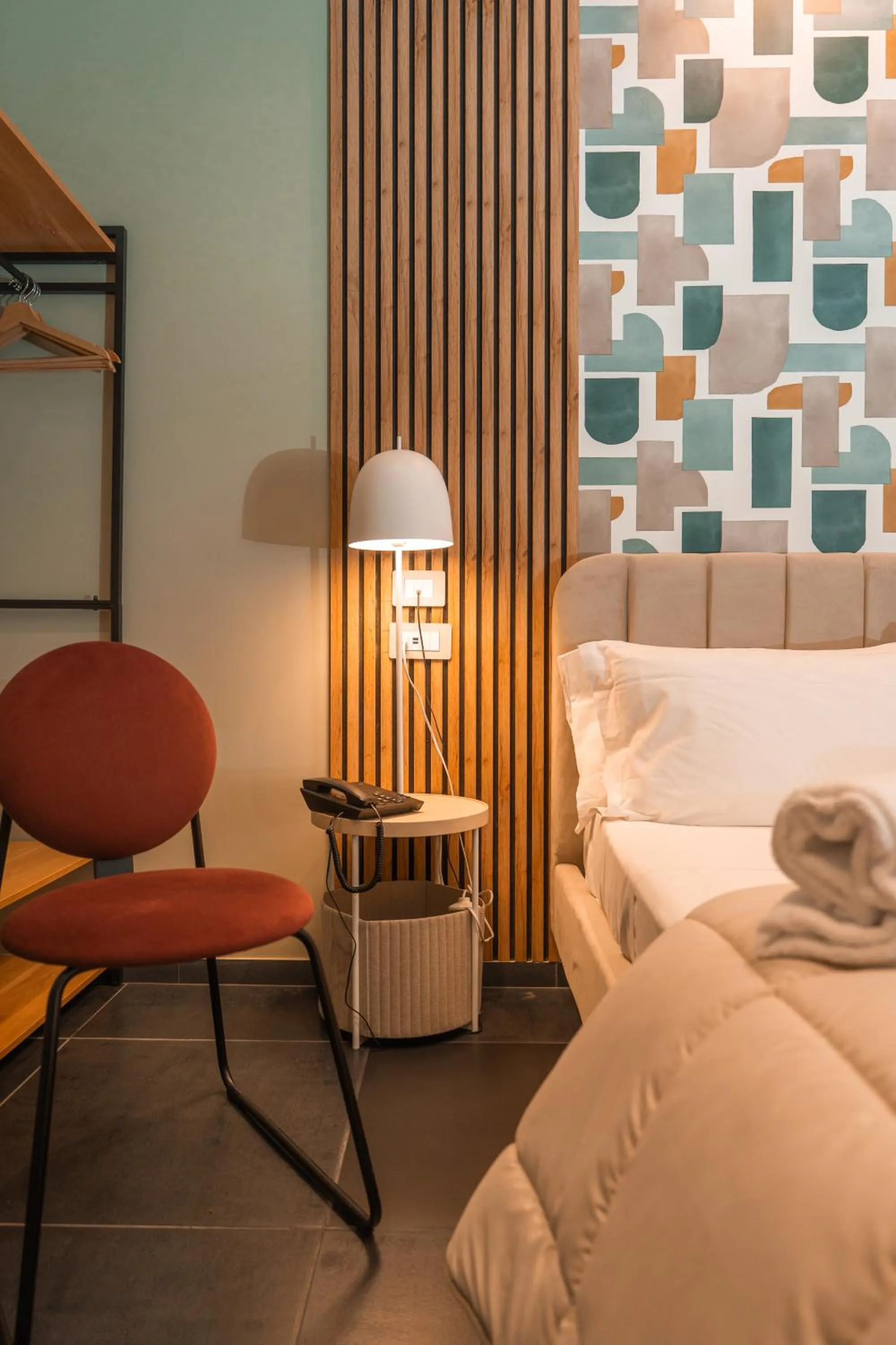 Bed in Noah Gate Hotel & Suites