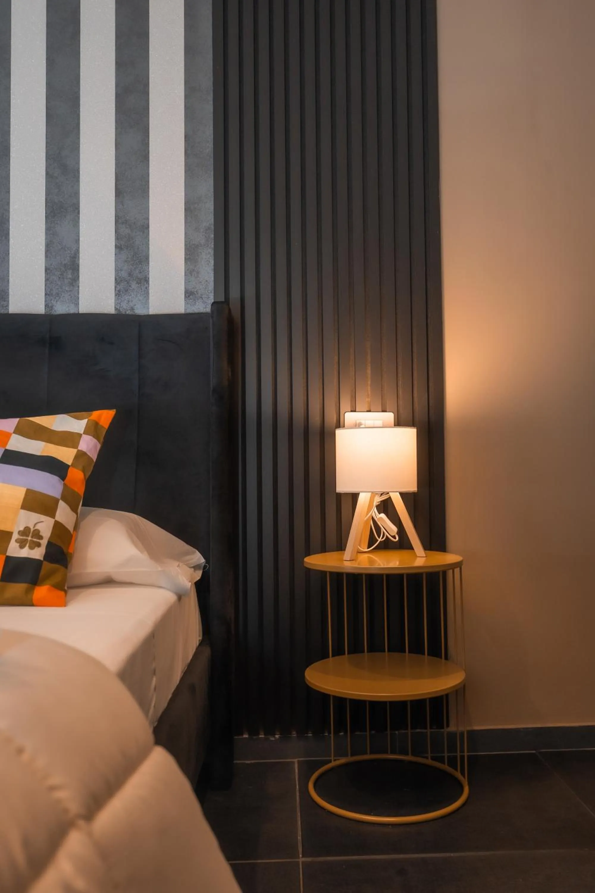 Bed in Noah Gate Hotel & Suites