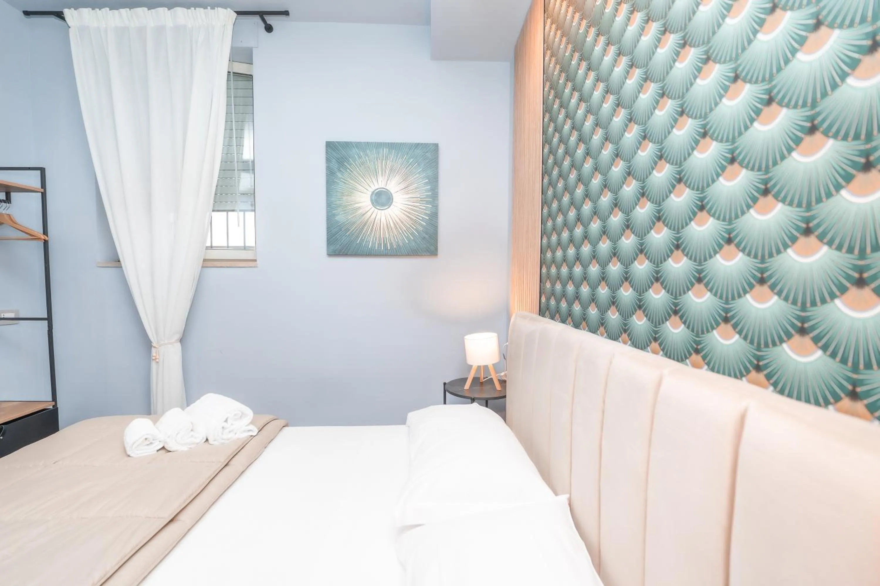 Bed in Noah Gate Hotel & Suites