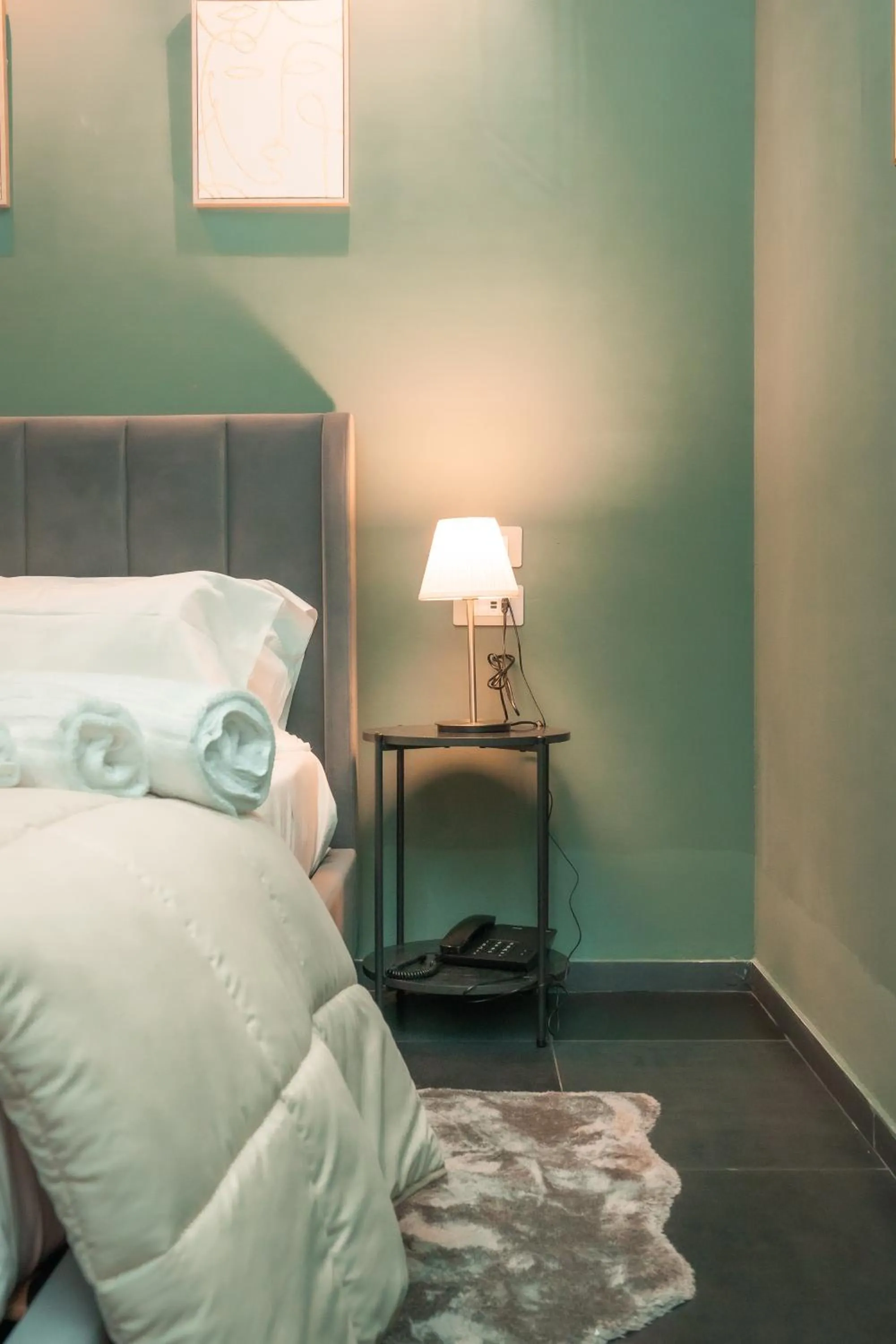Bed in Noah Gate Hotel & Suites