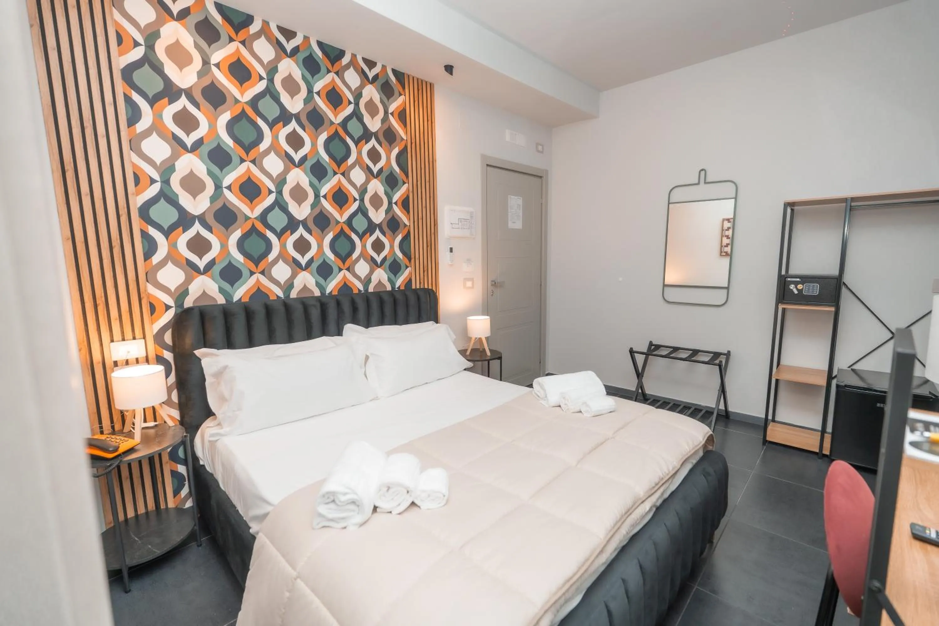 Bed in Noah Gate Hotel & Suites