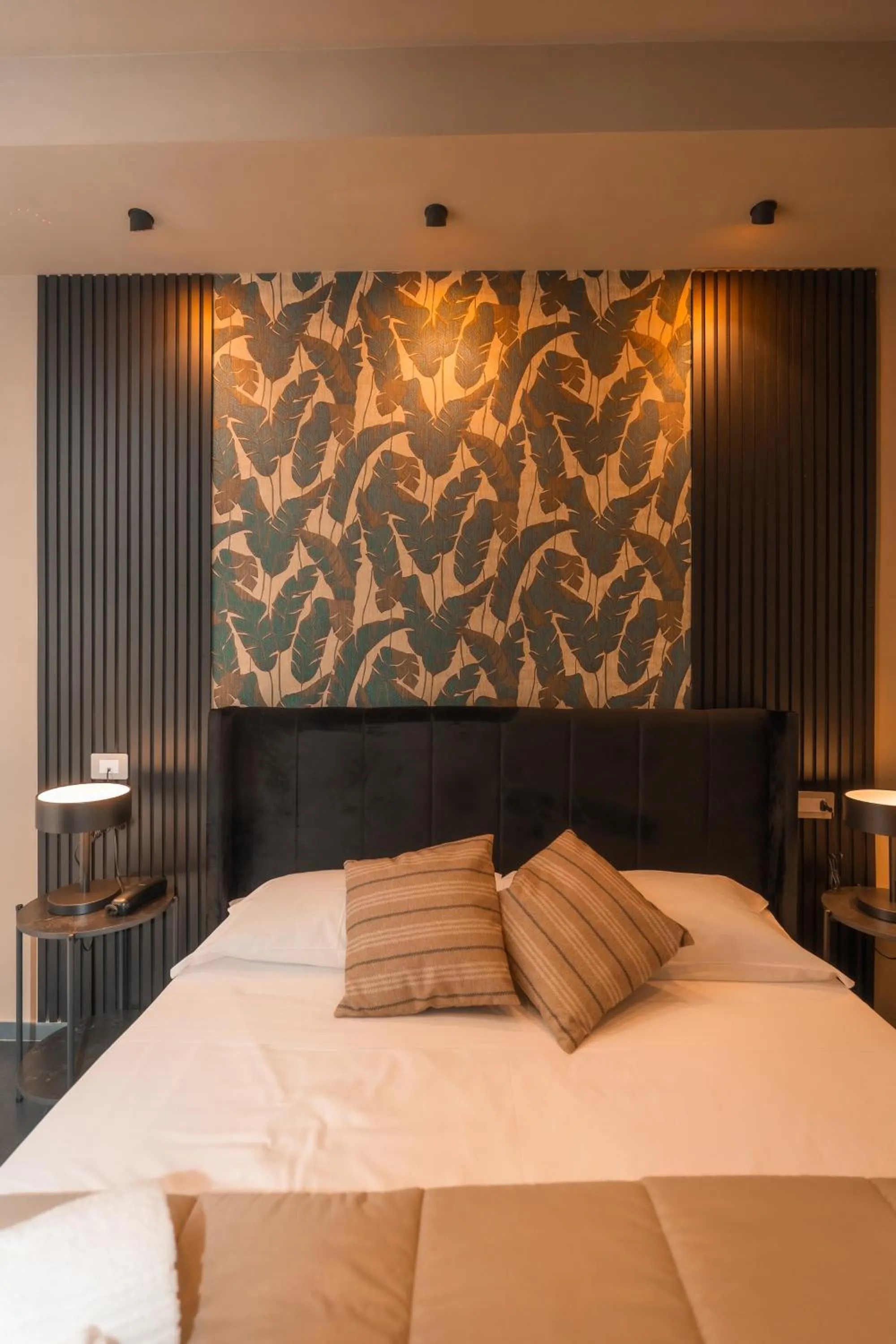 Bed in Noah Gate Hotel & Suites