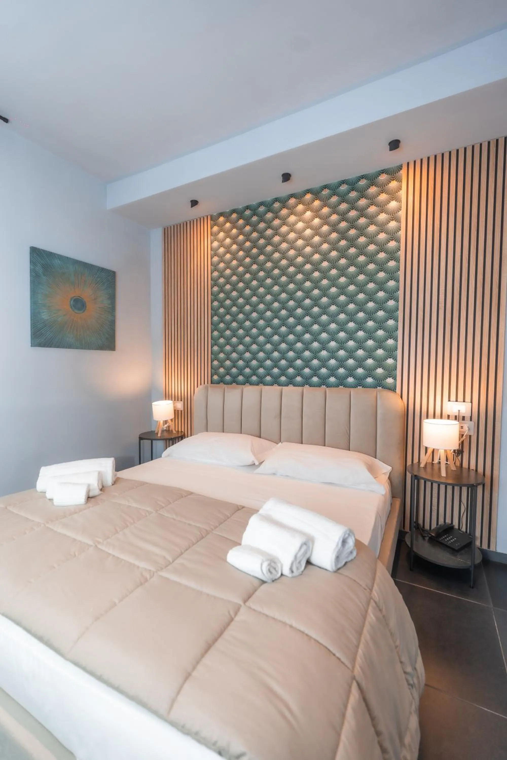 Bed in Noah Gate Hotel & Suites