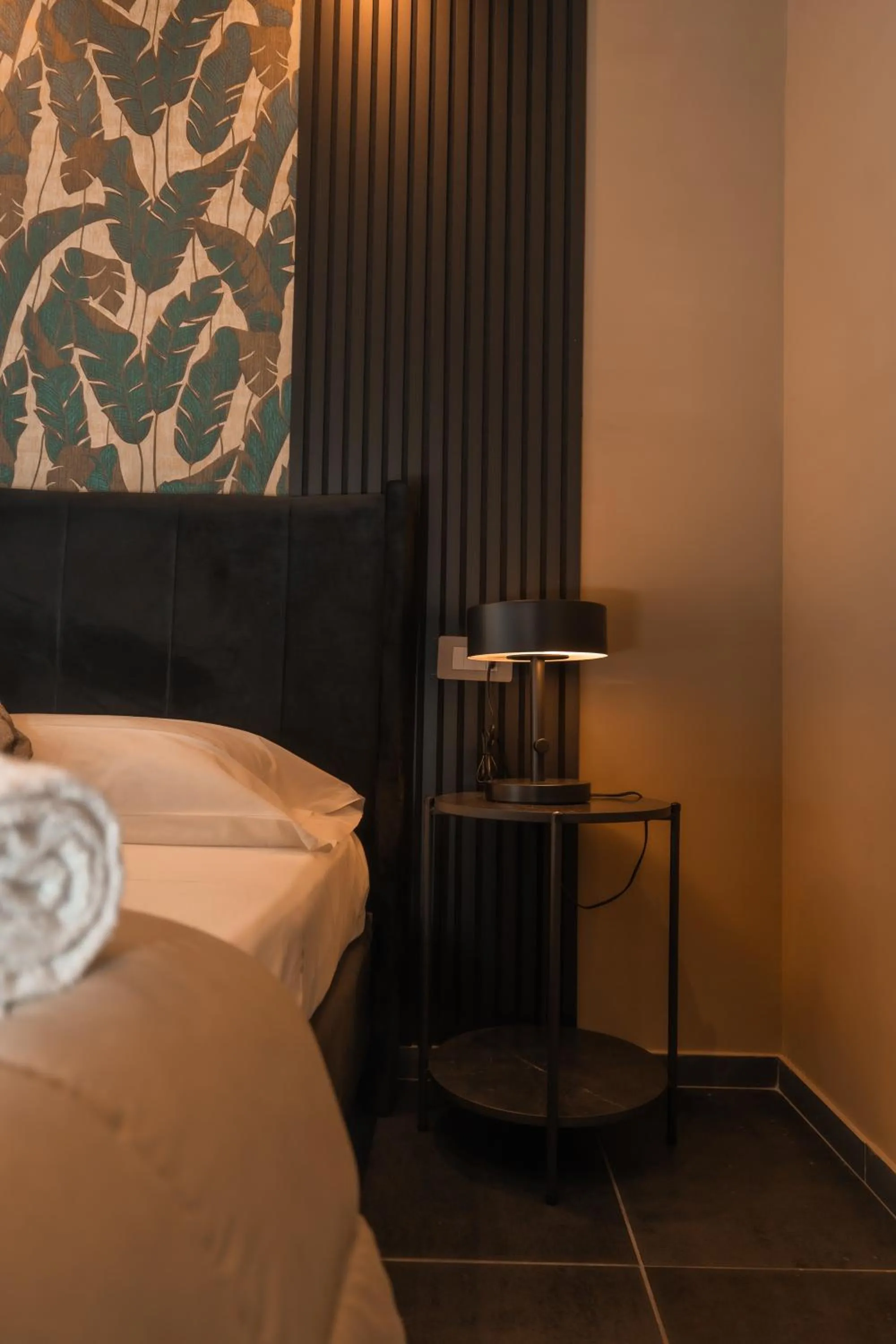 Bed in Noah Gate Hotel & Suites