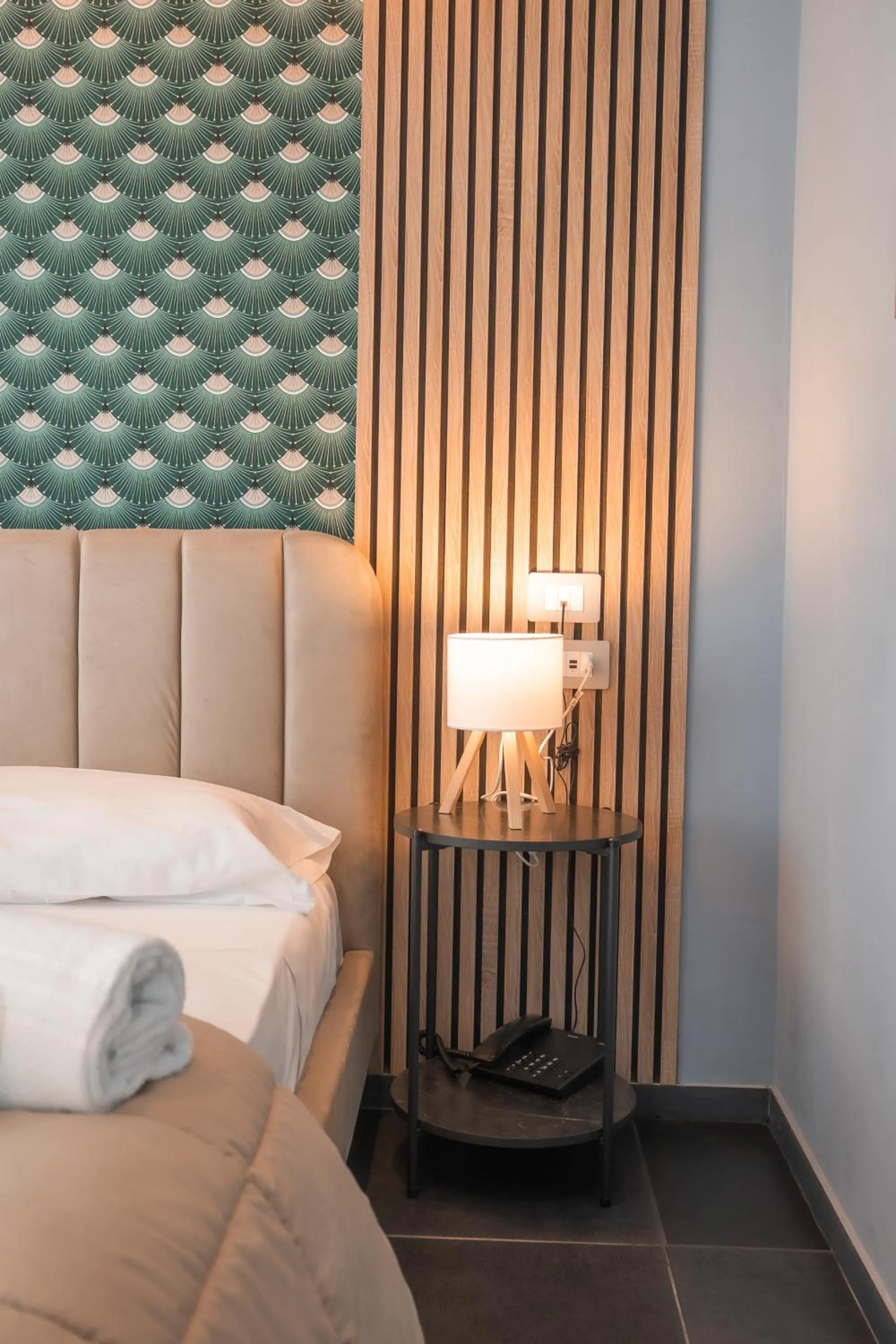 Bed in Noah Gate Hotel & Suites