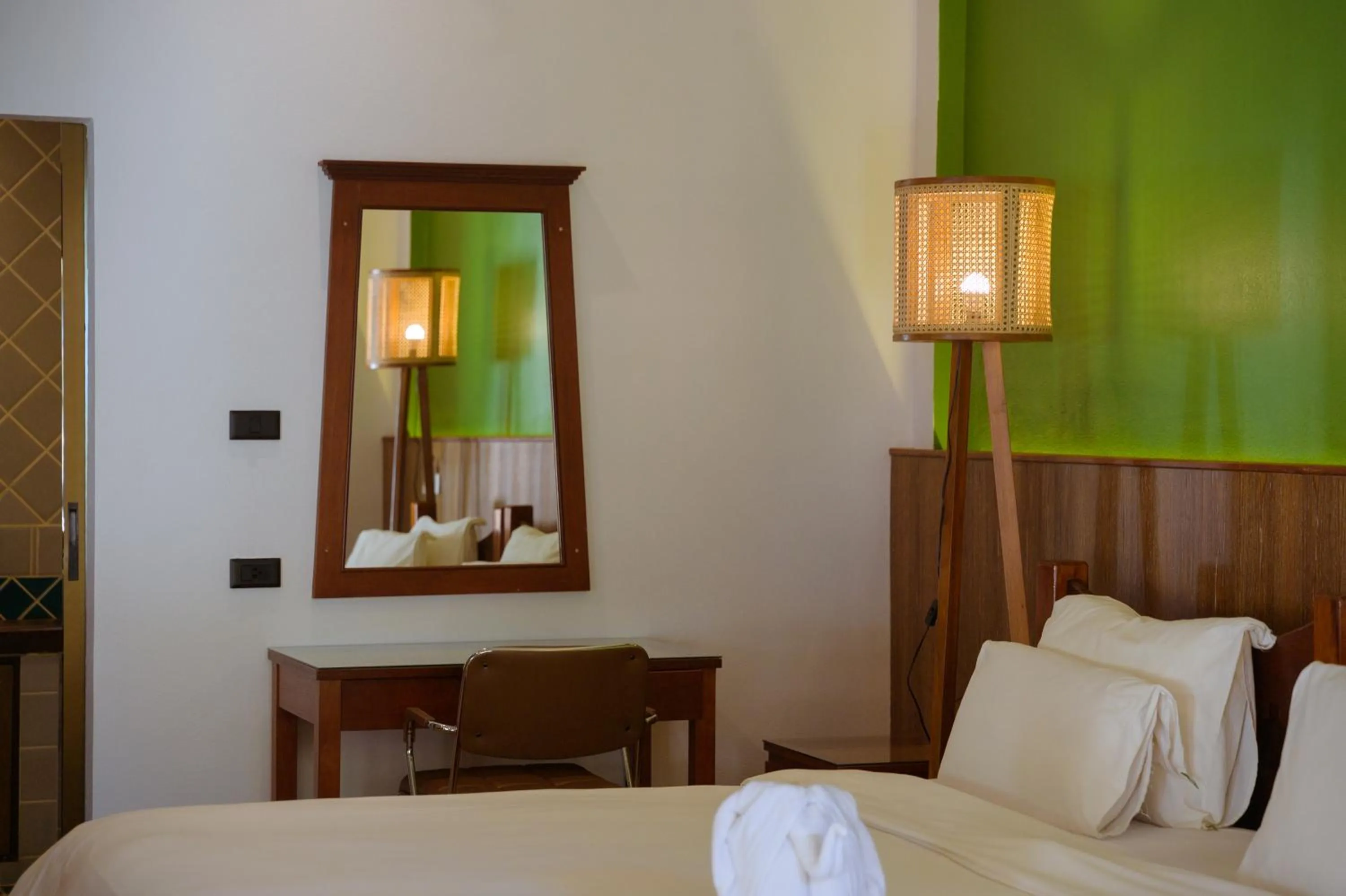 Seating area, Bed in K.B. Resort