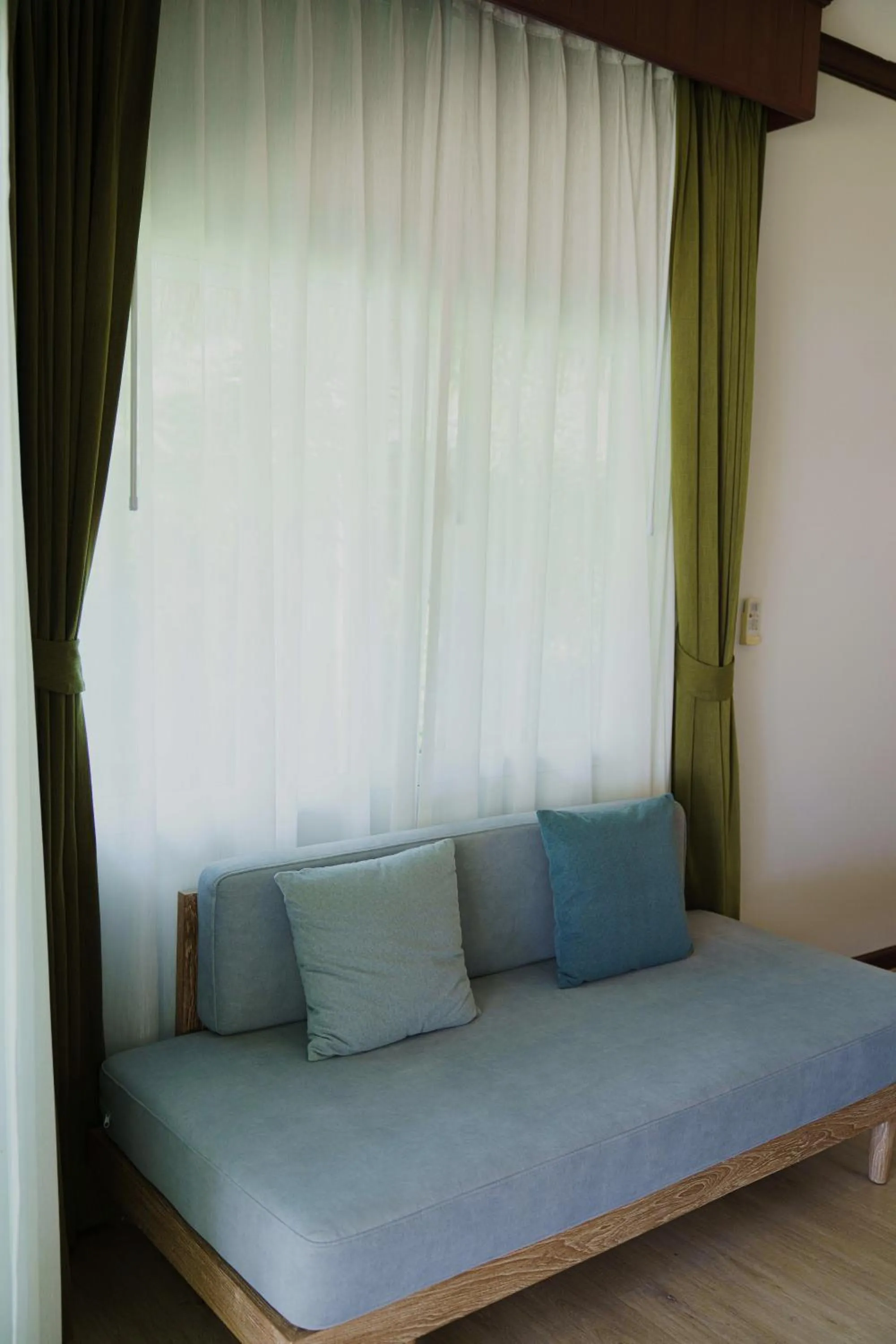 Seating area, Bed in K.B. Resort