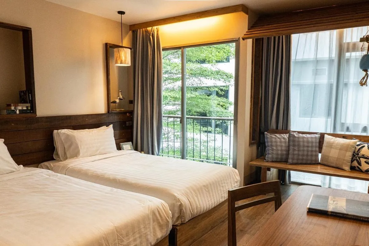 Photo of the whole room, Bed in Tints of Blue Hotel