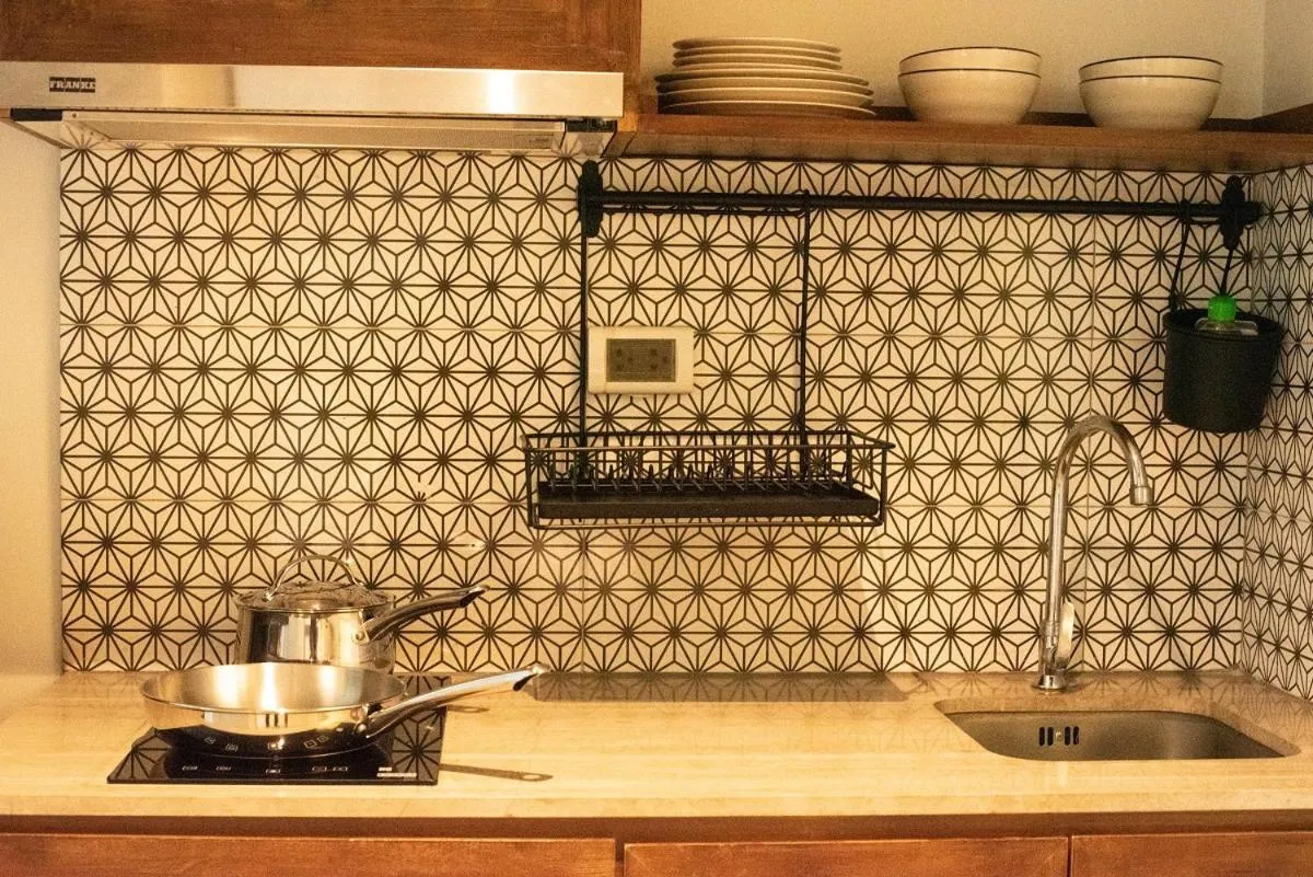 Kitchen or kitchenette in Tints of Blue Hotel