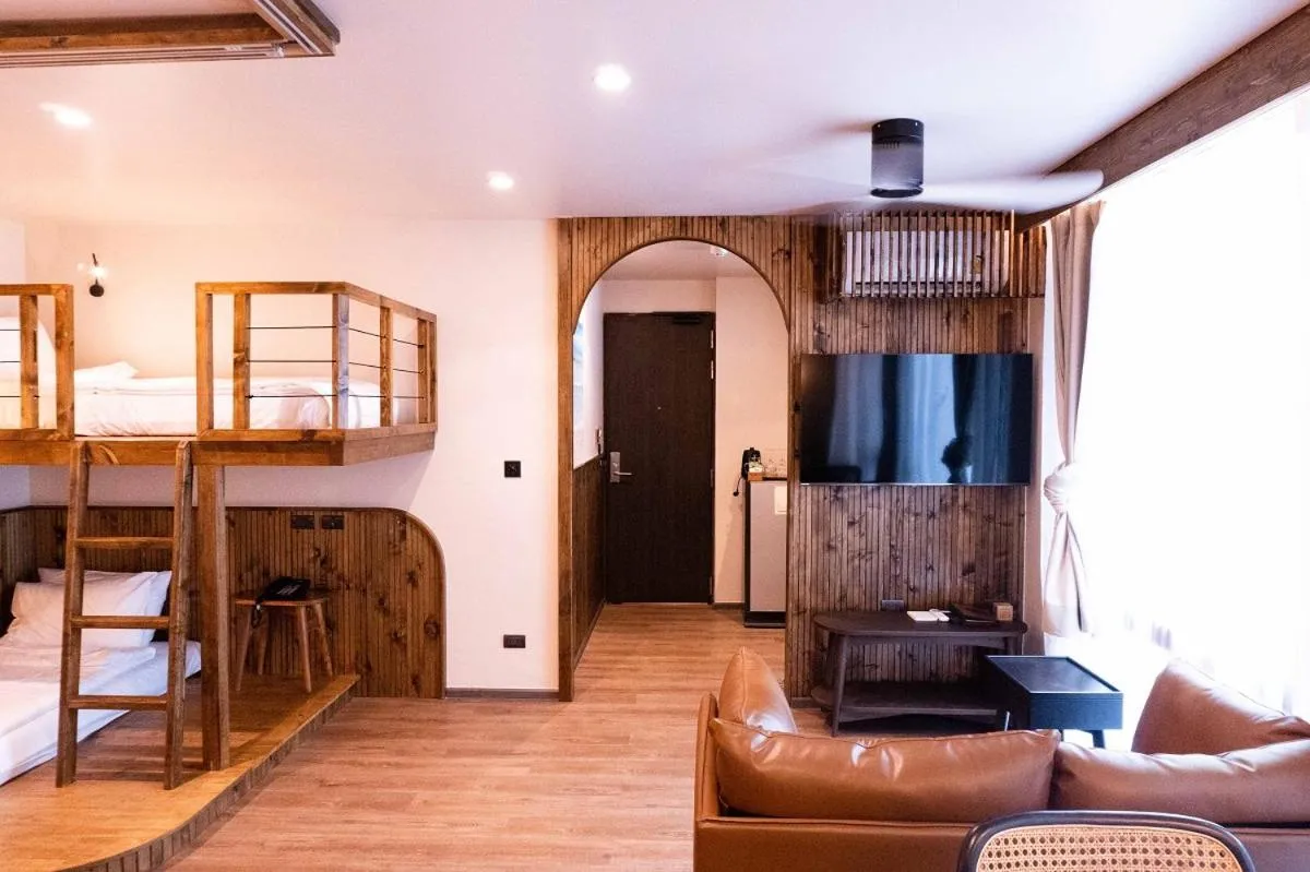 Living room, Bed in Tints of Blue Hotel