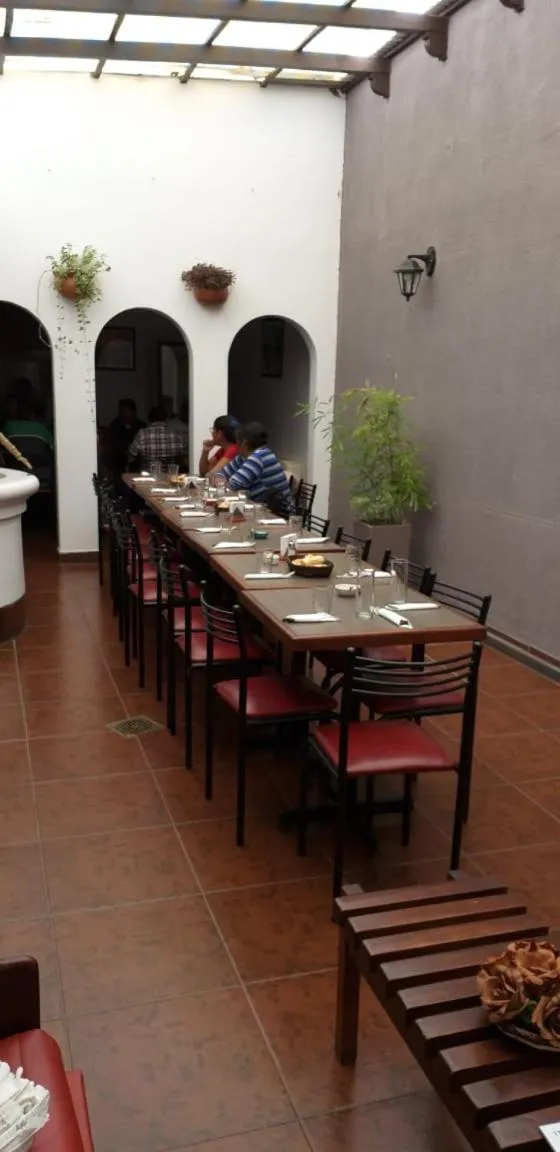 Communal lounge/ TV room in Hostal el Aljibe