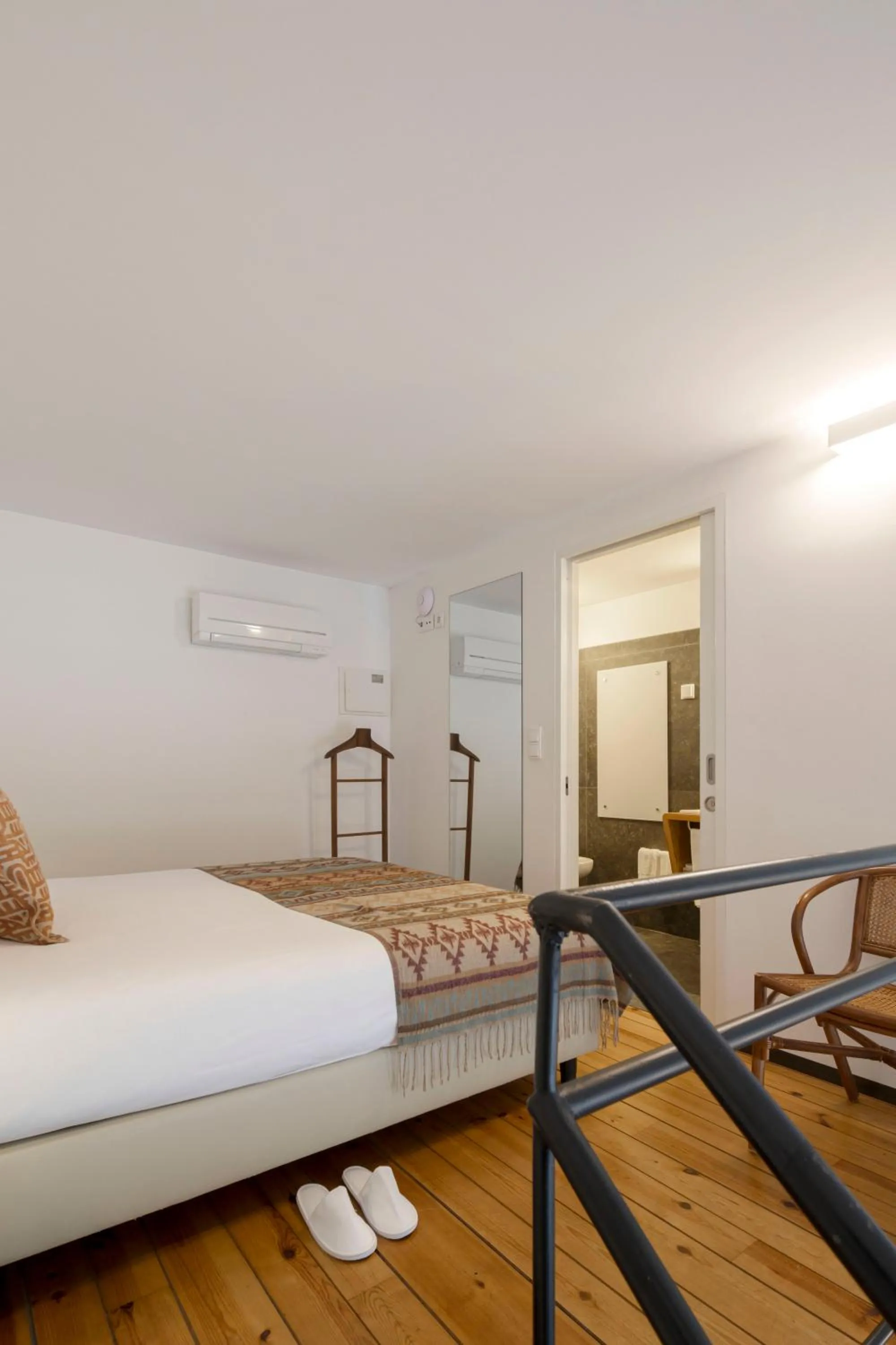 Bed in Condes de Azevedo Palace Apartments