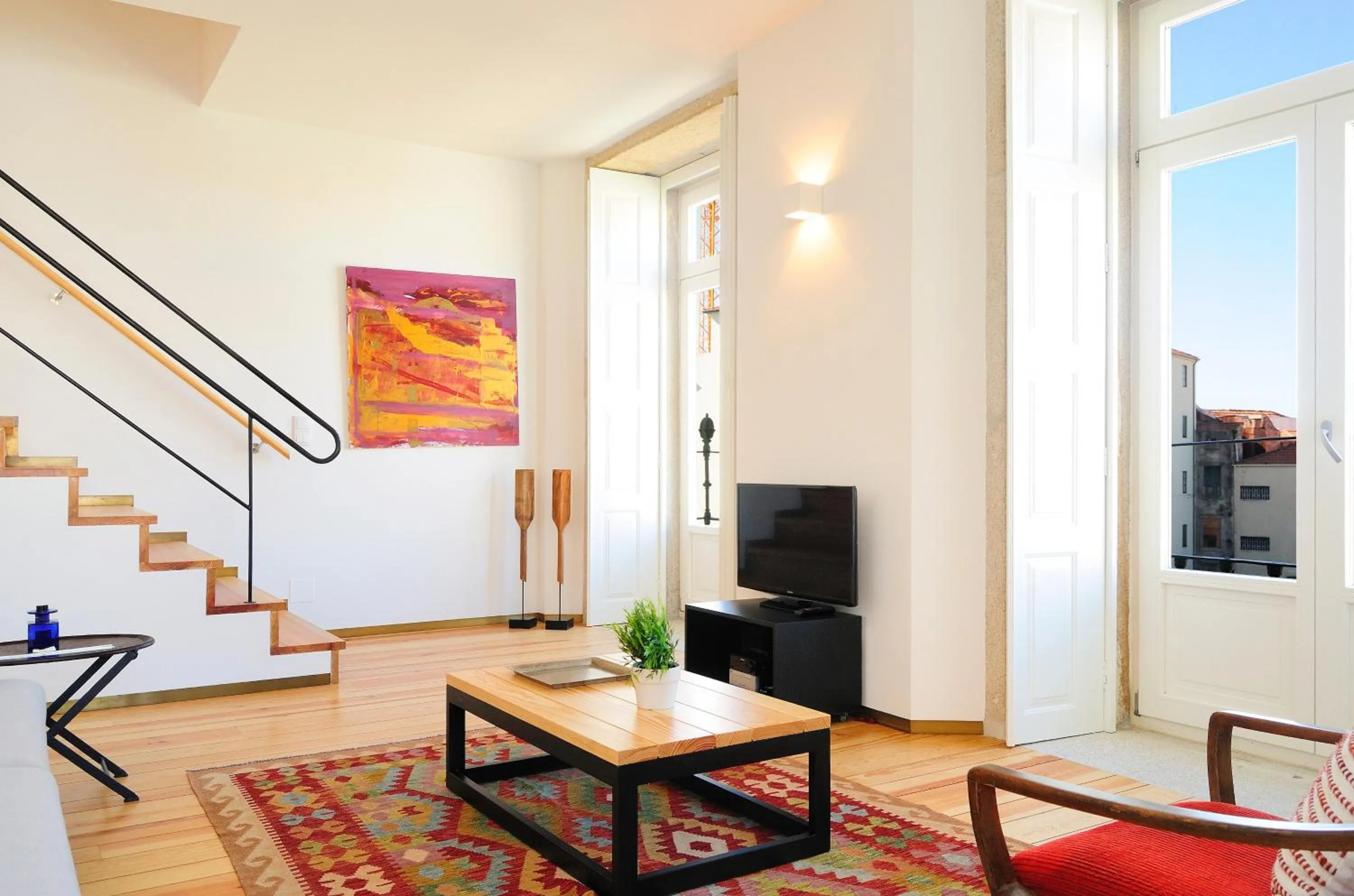 Living room in Condes de Azevedo Palace Apartments