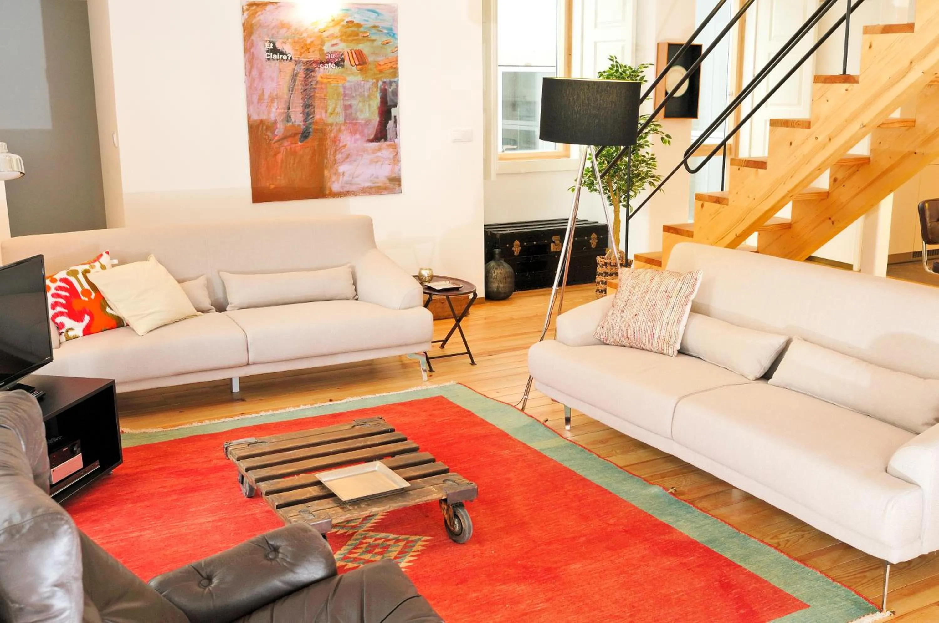 Living room in Condes de Azevedo Palace Apartments