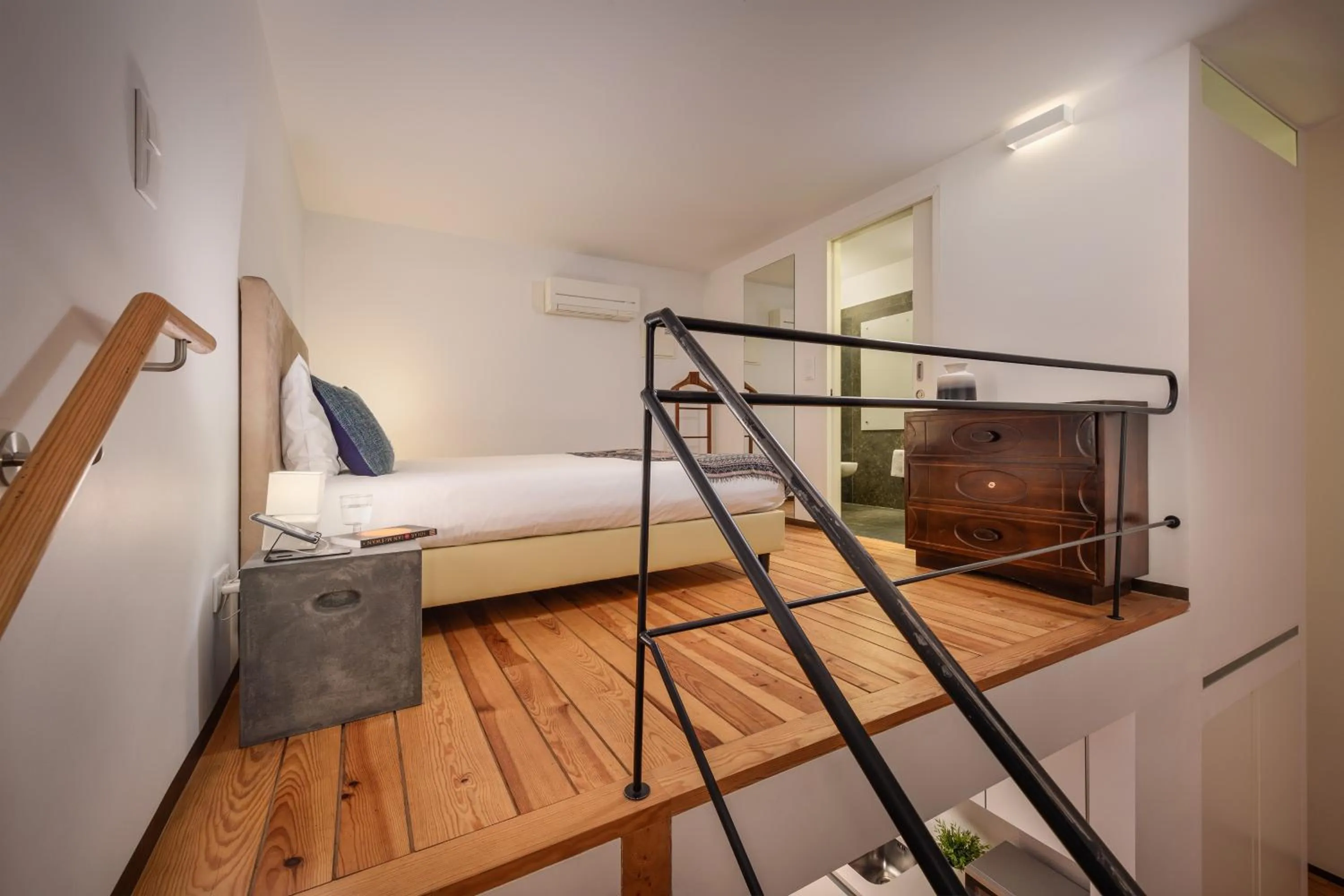 Bed in Condes de Azevedo Palace Apartments