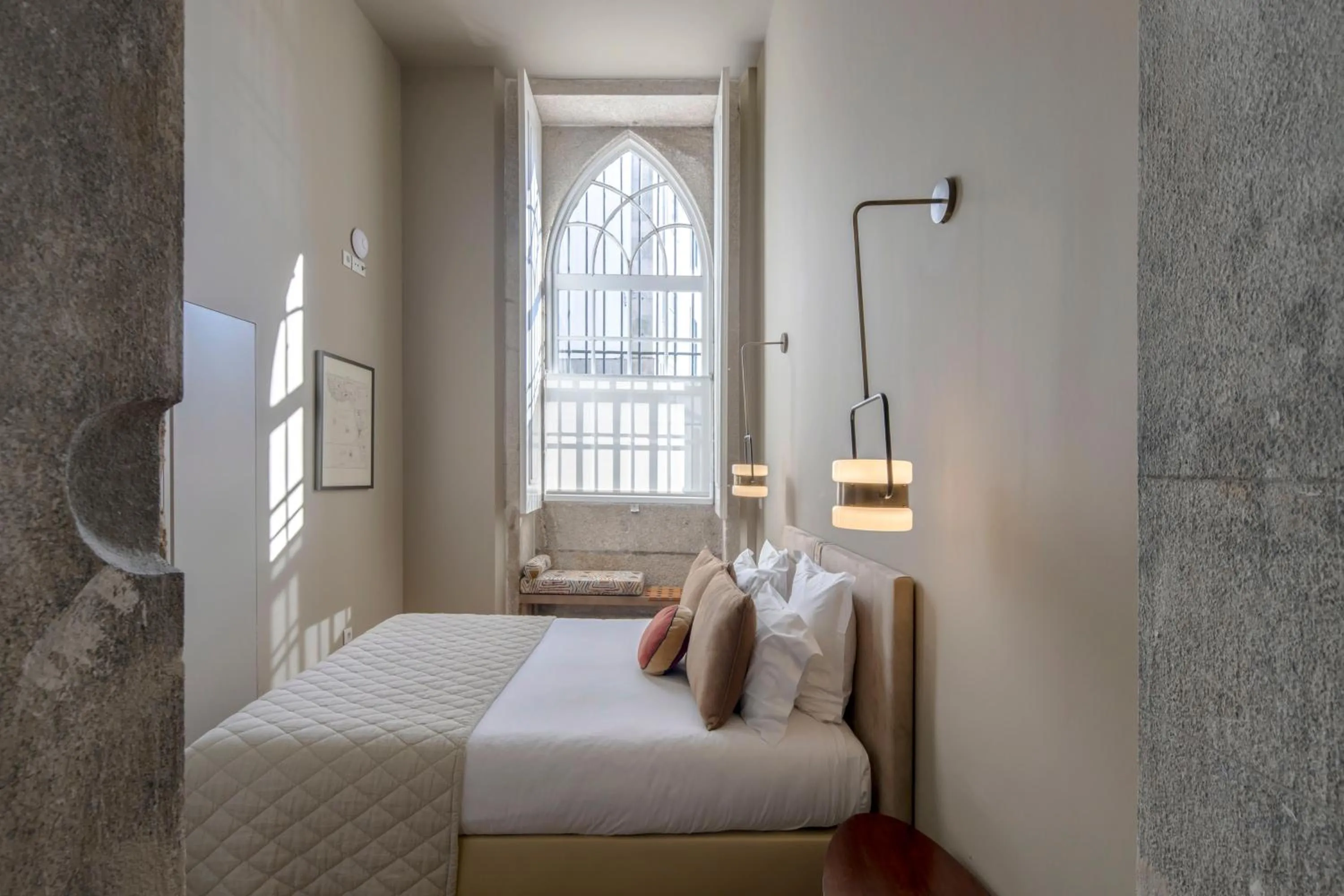 Bed in Condes de Azevedo Palace Apartments