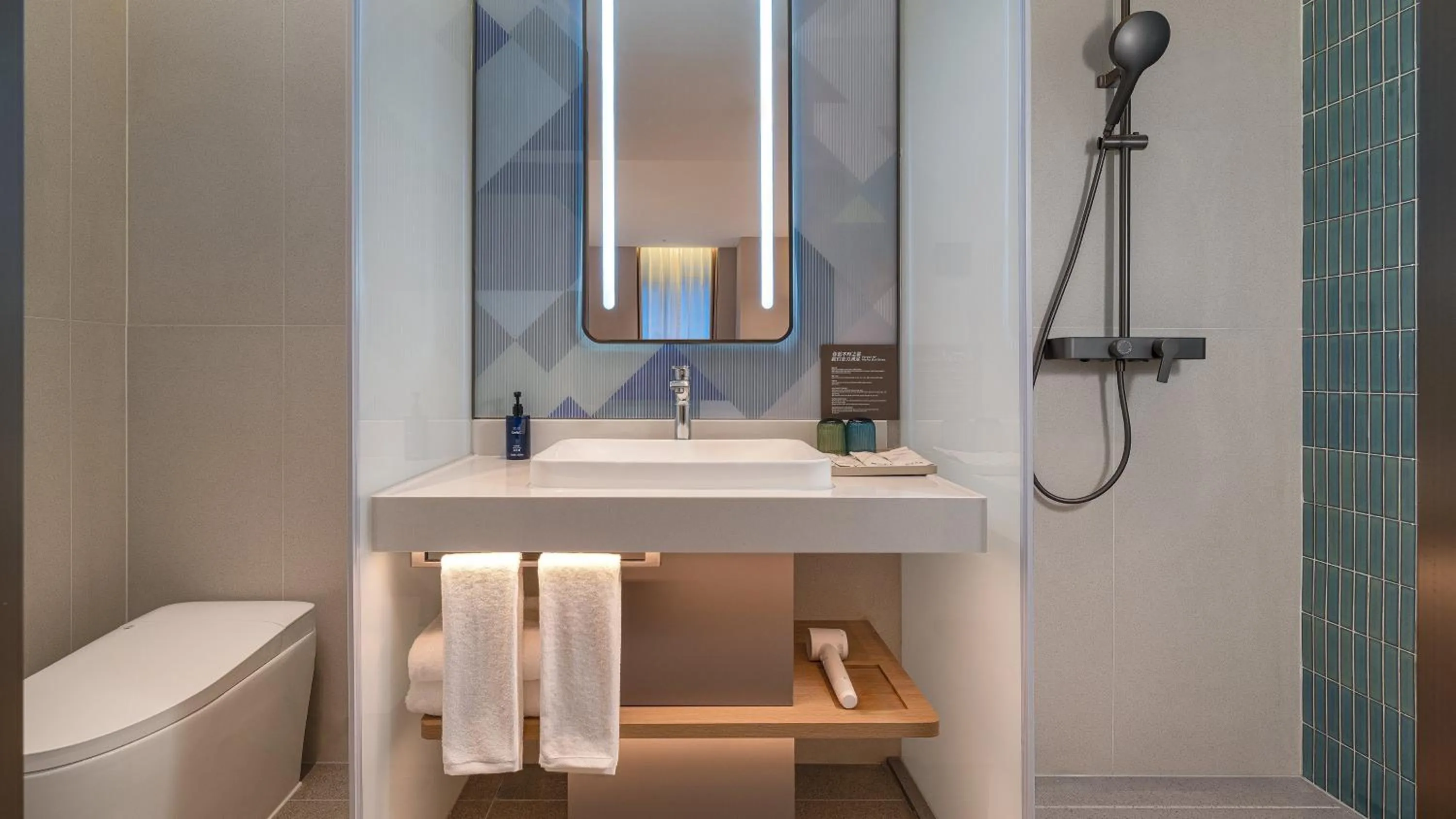 Bathroom in Holiday Inn Express Kunming Dianchi Rixin Road by IHG