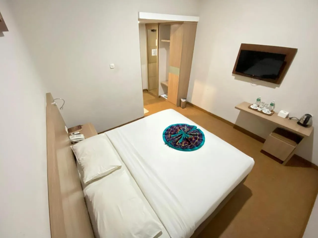 Bed in Grand Bunda Hotel Syariah Bukittinggi Powered By Archipelago