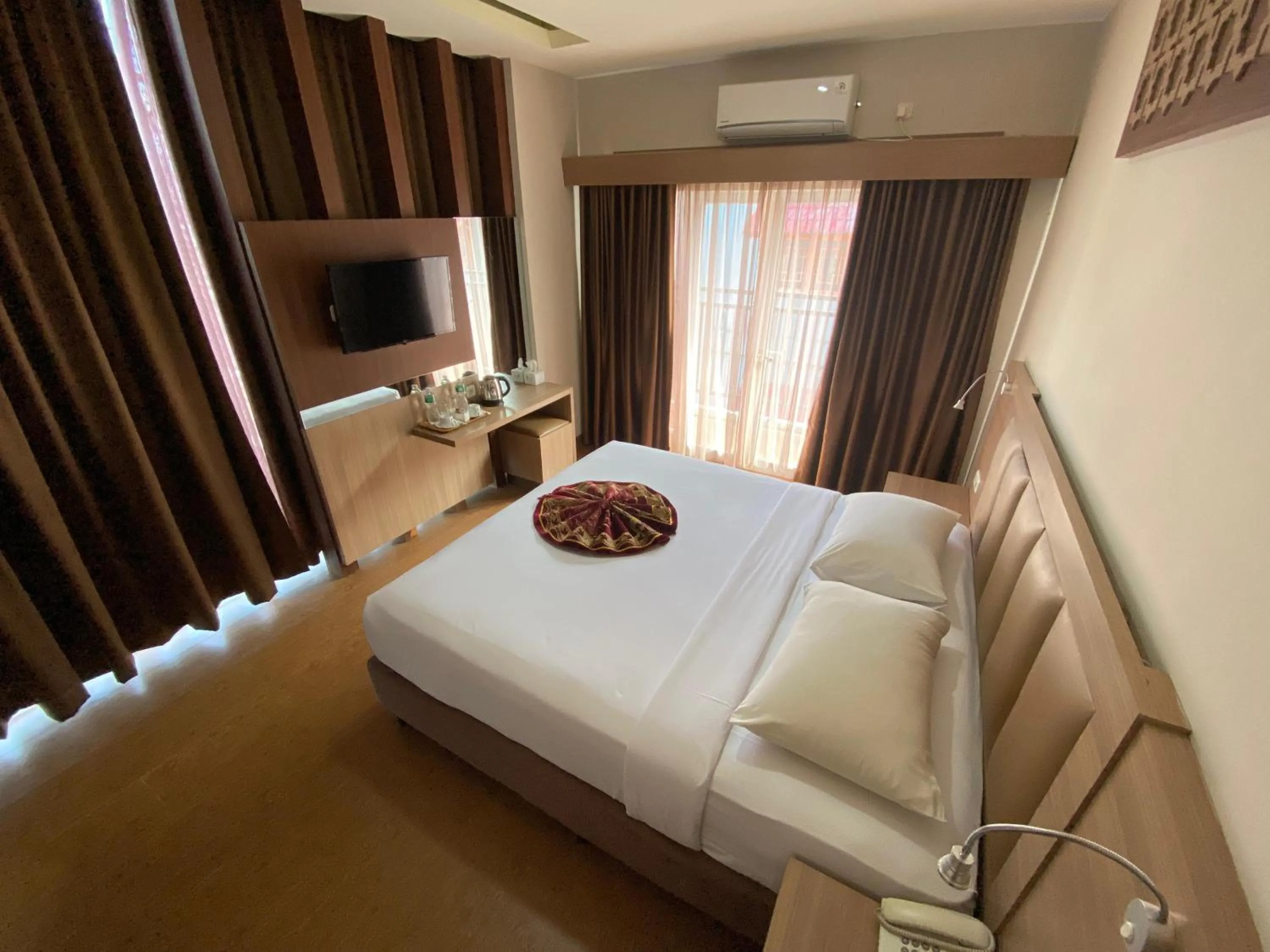 Bed in Grand Bunda Hotel Syariah Bukittinggi Powered By Archipelago