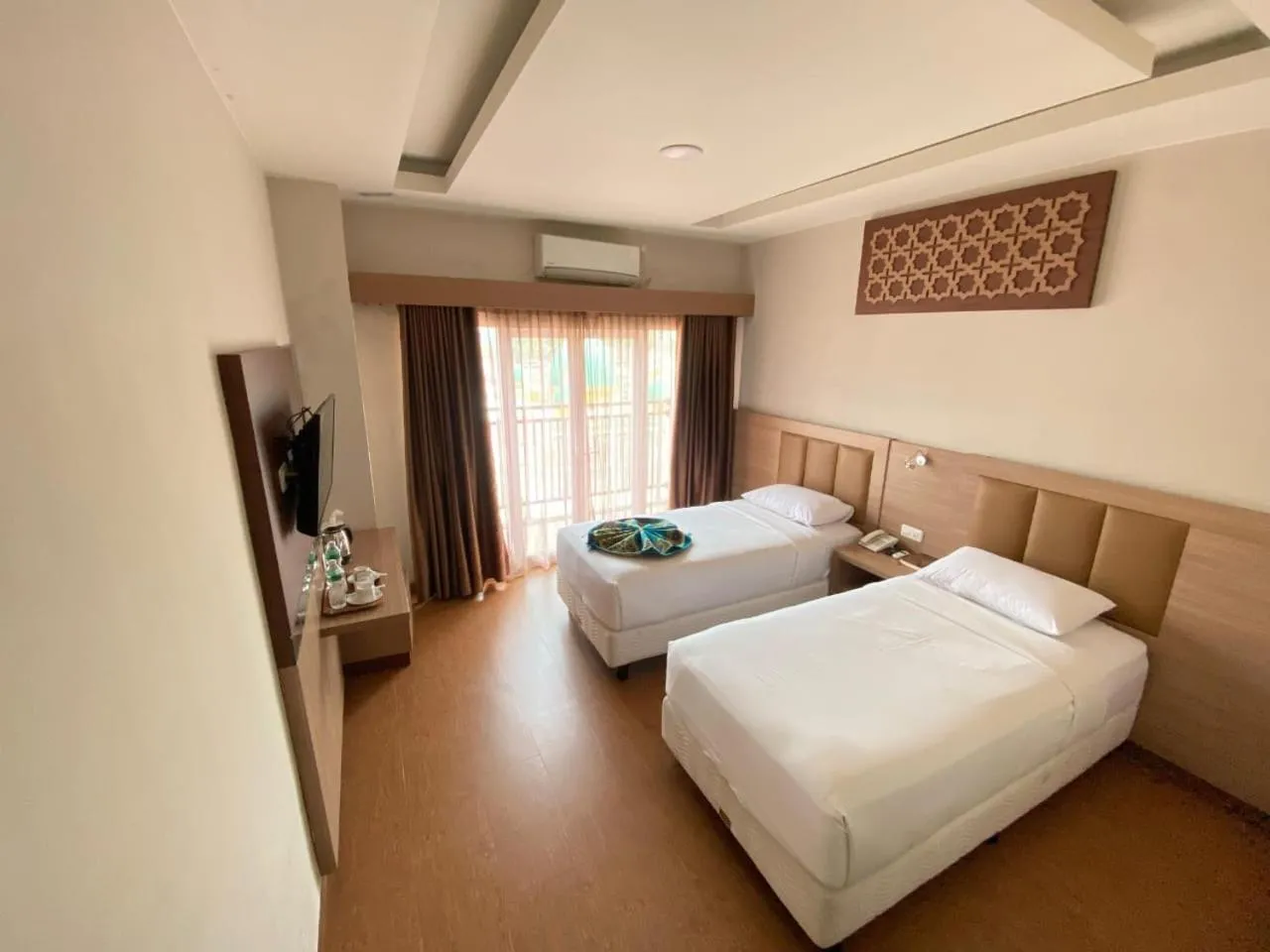 Bed in Grand Bunda Hotel Syariah Bukittinggi Powered By Archipelago